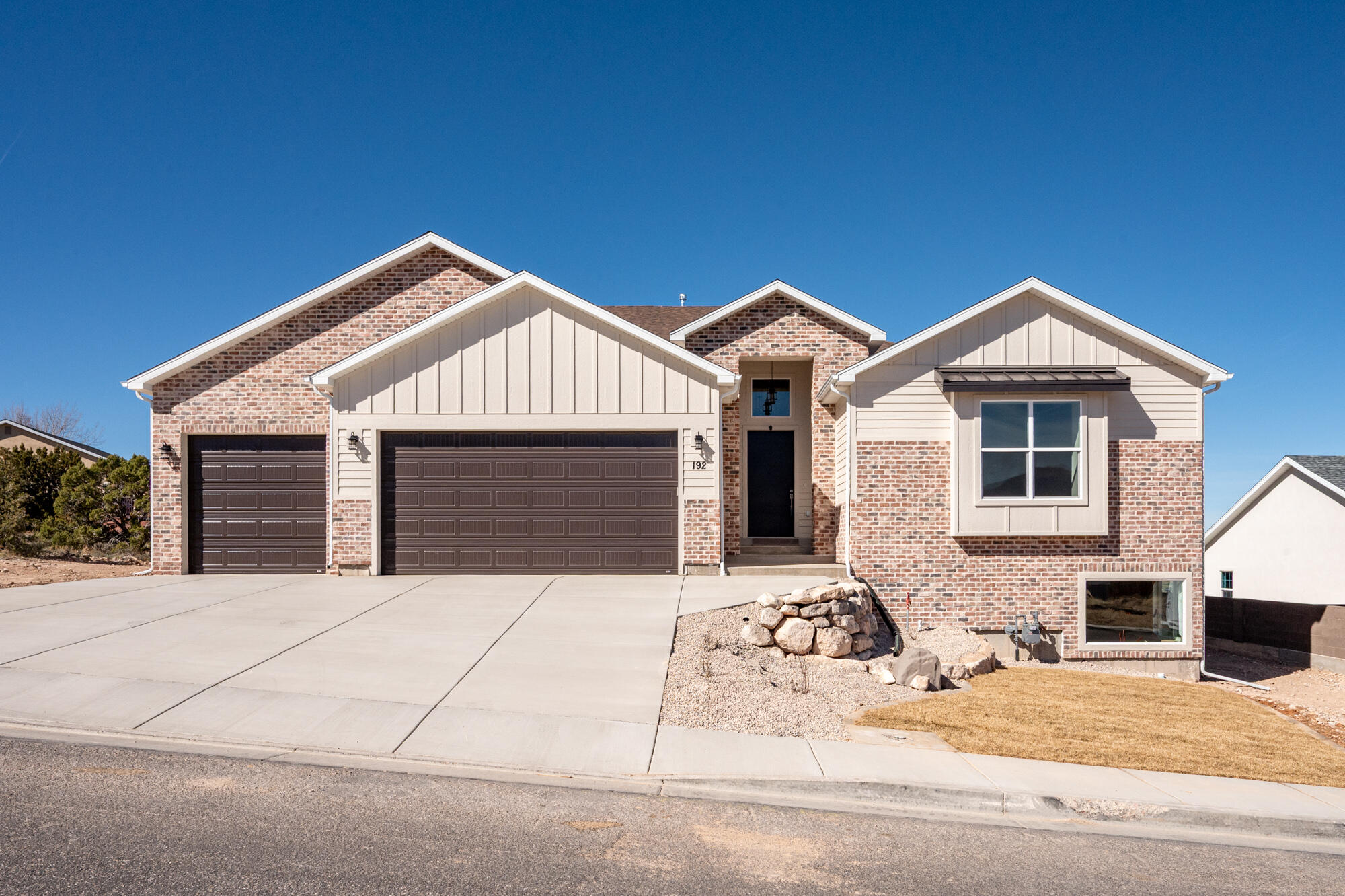This beautiful designed FULLY FINISHED new construction home offers exceptional space, comfort, and scenic views. 7 bedrooms, 7.5 bathrooms, 3 laundry and 4 family rooms. The open living area showcases upgrades throughout, a beautiful fireplace, 13' tall ceilings and large windows that capture the surrounding views. The kitchen includes a walk-in pantry, quality finishes, and ample space for entertaining. The main level features four bedrooms, three of which include private bathrooms, providing excellent privacy and flexibility. The primary suite is a standout, offering a spa-style shower with dual shower heads, a spacious walk-in closet, and private laundry hookups within the closet for added convenience. Dual furnace controls allow efficient climate management. This is a large home!!!

The walk-out basement offers natural light with large windows and fully finished. 2 bedrooms with private full bathrooms and 1 additional full bathroom and a laundry room. Additional features include a three-car garage and covered outdoor living areas, wired for security and smart panel. Taxes are undetermined.