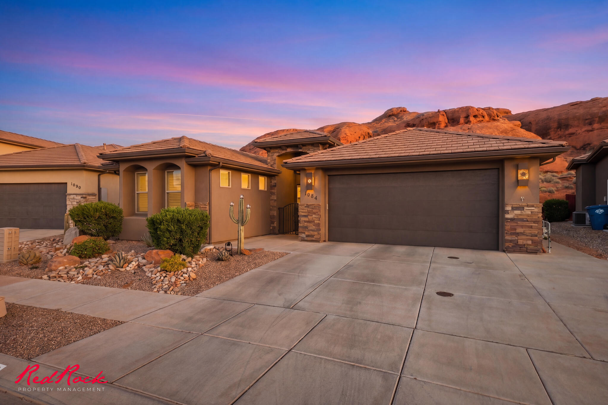 Welcome to this beautifully appointed 4-bedroom, 2.5-bath home, where comfort meets elevated design. Thoughtfully crafted with an open floor plan and soaring vaulted ceilings, this residence offers a bright and airy atmosphere enhanced by expansive windows that fill the space with natural light.

The gourmet kitchen is a standout feature, complete with sleek granite countertops, custom cabinetry, and a premium nugget ice maker--perfect for entertaining or everyday luxury. Additional custom built-ins in both the pantry and garage provide exceptional organization and functionality.

The spacious primary suite is a private retreat, designed for unwinding after a long day.

Step outside to a truly one-of-a-kind backyard oasis. Surrounded by stunning red rock landscapes, this tranquil outdoor space offers a rare sense of peace and natural beauty--ideal for quiet mornings, evening gatherings, or simply enjoying the serene setting.

This is more than a home--it's a refined lifestyle in a remarkable setting.
