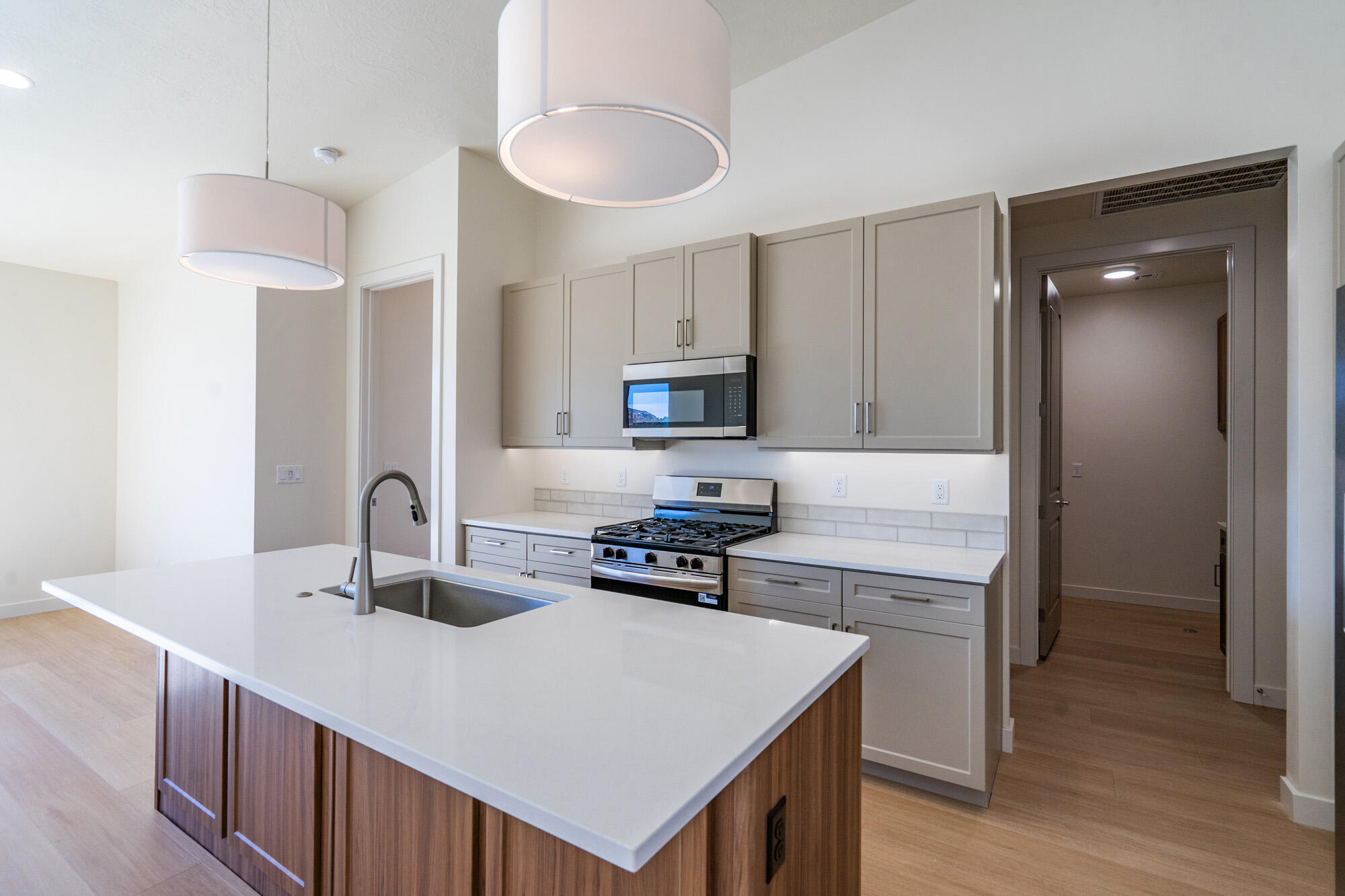 The Aurora - This well-designed 2-bedroom, 2-bath home offers modern living with an open-concept layout connecting the spacious great room and stylish kitchen. Features include thermofoil cabinetry, granite countertops, a single-bowl stainless steel undermount sink, and a Frigidaire stainless steel appliance package with electric range, microwave hood, dishwasher, and refrigerator. Interior finishes include two-tone paint, tile or LVP carpet in main living areas, and bedrooms, can lighting throughout, and ceiling fans in the living room and bedrooms. Bathrooms feature Moen plumbing fixtures and custom tiled showers/tub surrounds. Additional highlights include a laundry room with sink cabinet, with 50-amp EV breaker and room for a workshop or toys, block walls, and backyard space. Community amenities include a pool, hot tub, pool house, pickleball court, playground, and RV parking.
Builder incentives available with preferred lender. Qualified buyers may obtain:
• Conventional 7/6 ARM - initial interest rate ~5.50% on an adjustable-rate mortgage (ARM), fixed 7 yrs, adjusts semiannually
• FHA 5/1 ARM - initial interest rate ~4.75% on an adjustable-rate mortgage (ARM), fixed 5 yrs, adjusts annually
Seller contributes 2.5% + lender contributes 1.5% (with Guild Mortgage), which may be used toward a temporary rate buydown, closing costs, and/or prepaids--reducing initial monthly payments. Lender Incentives available only when financing is obtained through Matt Hickman at Guild Mortgage.OAC. Rates subject to change. APR may be higher.