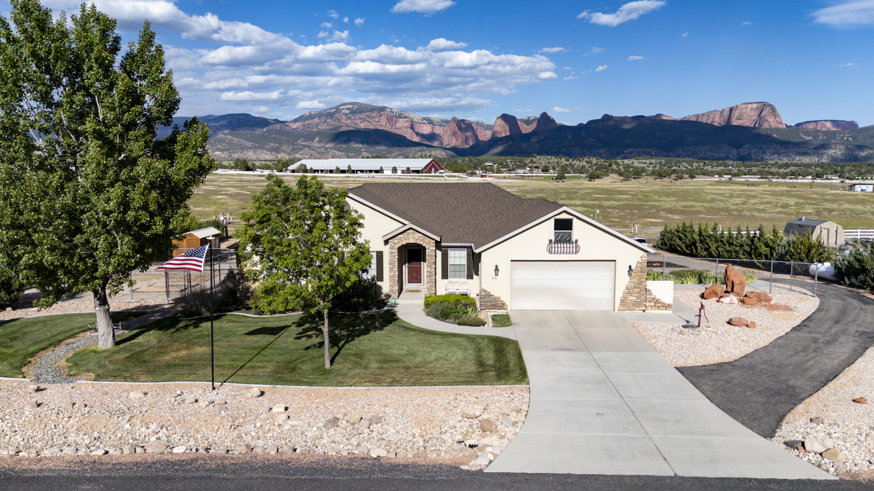 Enjoy country living in beautiful New Harmony with this spacious 5 bed, 3 bath home situated on almost a full acre lot. Featuring many upgrades throughout, this home offers both comfort and functionality with plenty of room to spread out inside and out. The large property is perfect for animals, outdoor activities, and creating the lifestyle you've been looking for. With wide open space, mountain views, and a peaceful setting, this property combines the charm of rural living with the convenience of a well-updated home. A great opportunity to enjoy extra space, privacy, and country living at its best!