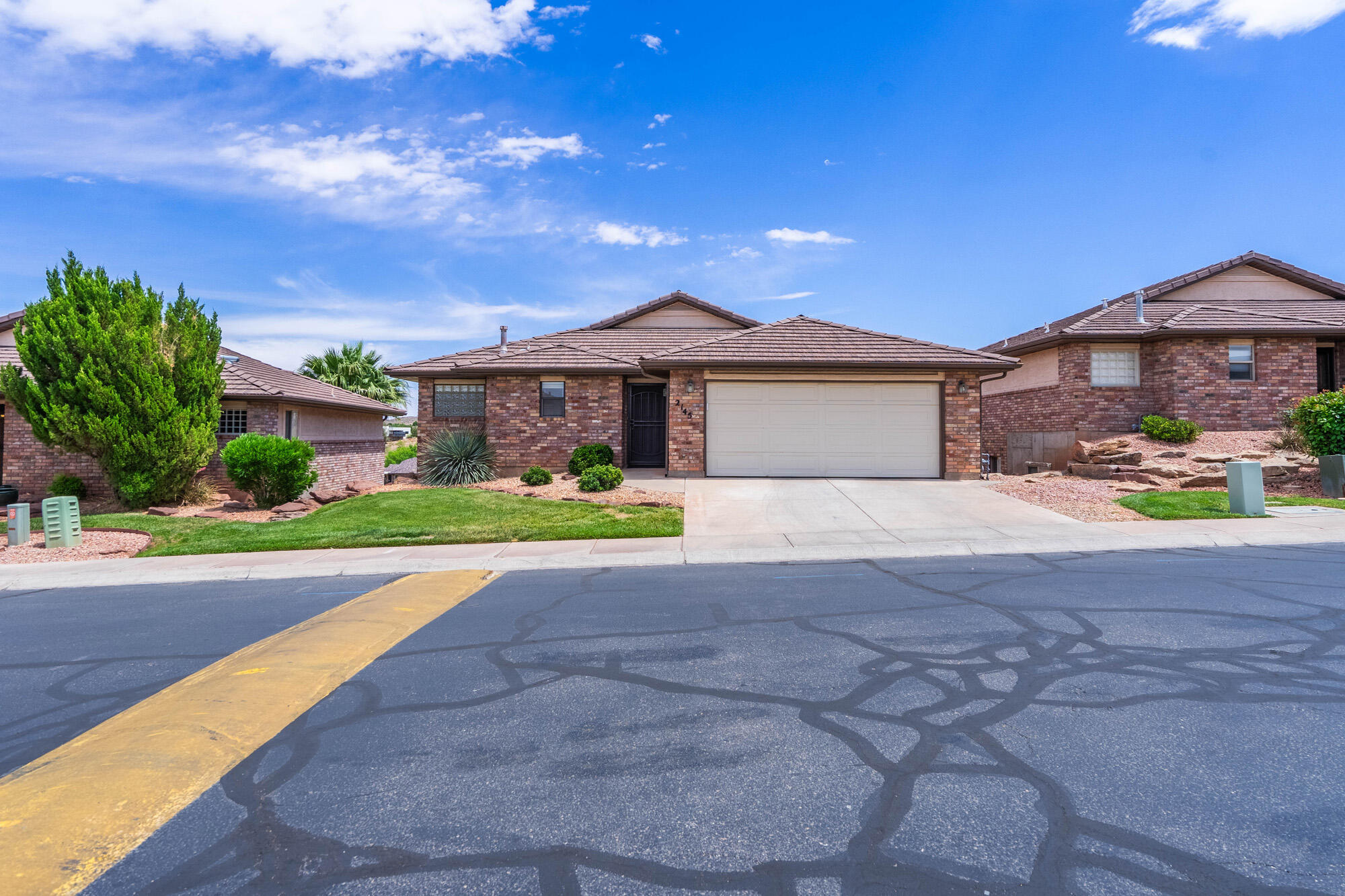 Lovely, light and bright, updated home ON THE GOLF COURSE, above 13th fairway of Southgate Golf Course.  UNOBSTRUCTED VIEWS of the Red Mountains, Zions, and city lights.  Open concept floor plan with vaulted ceilings, walkout basement, 3 bedrooms, 2.5 bathrooms, 2 family rooms. Extra storage in basement. Updated kitchen with granite counters, kitchen island with extra storage, stainless steel appliances. Furnitur package available.  Contact agent for details. 

Besides the clubhouse, with indoor pool, spa, rec rooms and gym room, and outdoor pool, pickleball and tennis courts, the HOA dues cover full yard maintenance, exterior insurance, roof repair and ALL water used inside and outside the home.