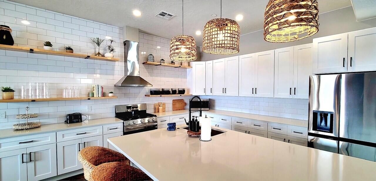 With in walking distance or minutes by car of incredible recreational opportunities.  New water park, rope obstacle course, Sand Hollow Reservoir, Golf Course as well as Zion National Park about 20 minutes away.  
The home comfortable sleeps 20+, comes fully furnished and professionally decorated with game tables that included poker, foosball and ping pong. An enclosed courtyard contains a private spa pool, gas bar be que and gathering area with fire feature.  Triple garage.  Pet friendly.  
Elim Valley community features street parking, tennis/pickle ball, community pool and park area.  Lovely tree lined streets with old world ambience. Seller will be participating in a 1031 exchange.