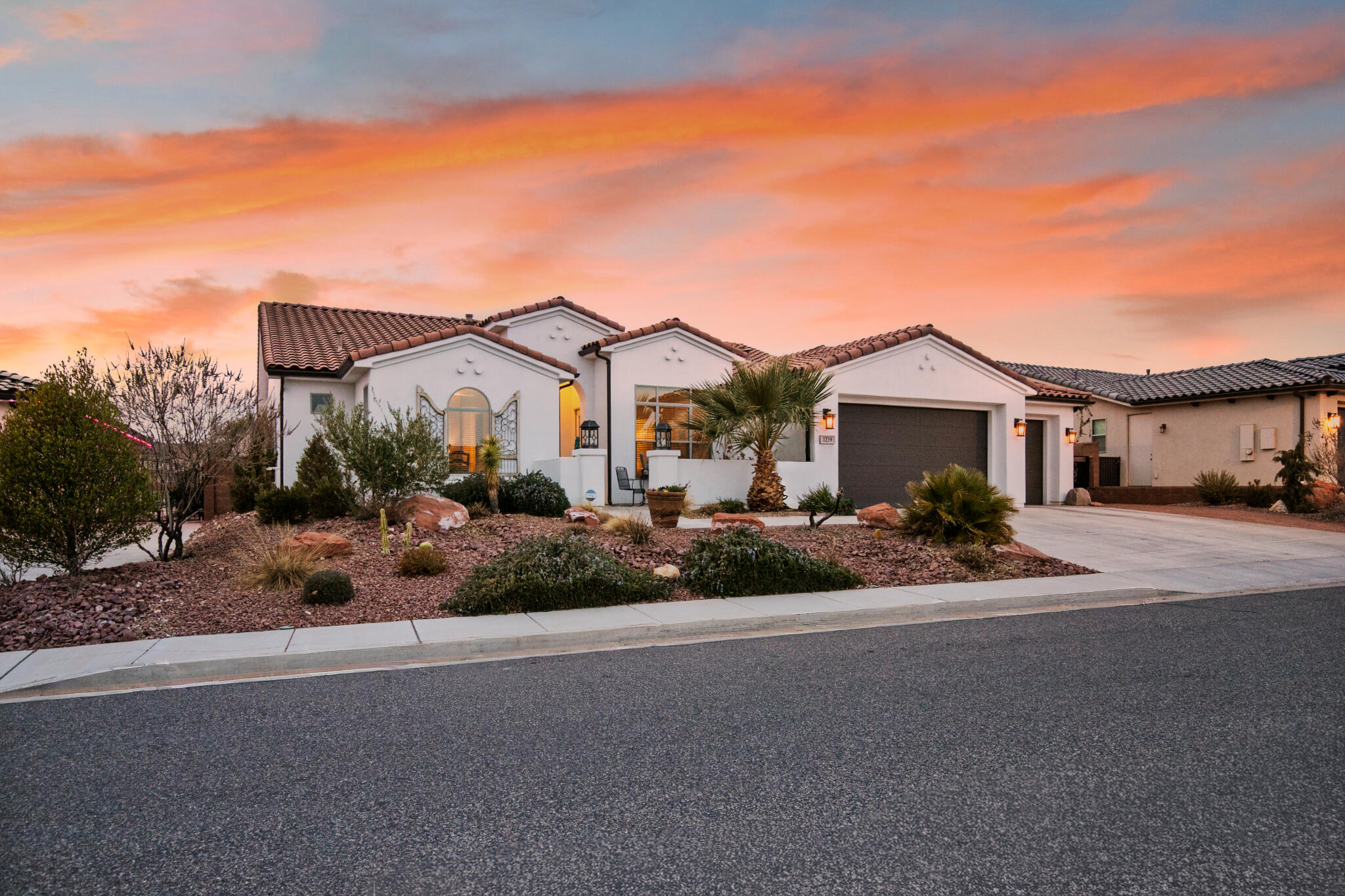 Stunning extended Amethyst model offering over 3,000 sq ft with 4 bedrooms, 4 baths, plus bonus theatre/bunk room. Situated on the largest lot in the subdivision (½ acre) with breathtaking golf course and mountain views. Designed for indoor-outdoor living with a 4-panel sliding glass door opening to a resort-style backyard featuring a 9-ft deep pool with diving board, rope swing, sun shelf, swim lane, fire pit lounge with TV, putting green, expansive lawn, outdoor shower, and space for a future outdoor kitchen. Dual gates provide golf course and gully access. Gourmet kitchen with generous dining space. Luxurious owner's suite with spa-style bath, oversized shower, soaking tub, dual vanities, and large walk-in closet.  Too many extras to mention.  Priced at Appraisal, don't miss this one. Additional features: Tesla solar panels with Powerwall backup, Rinnai instant hot water, landscape lighting, outdoor speakers, RV parking, and 3-car garage. Private resort living in one of the community's most desirable locations.