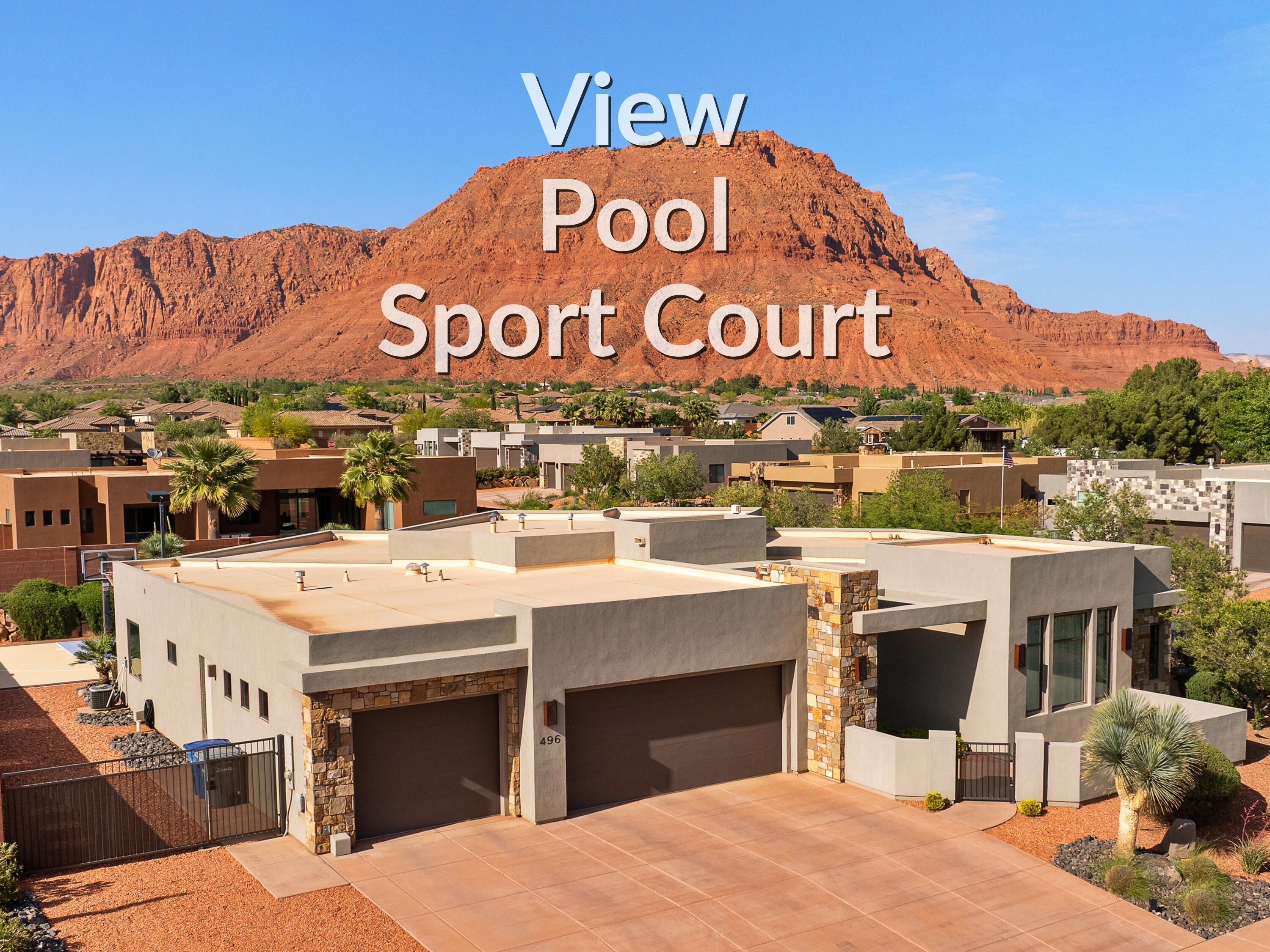 Panoramic Red Cliff Views. Resort-Style Living. Wake up each morning to glowing Southern Utah cliffs framed by walls of glass, then step outside to your private backyard paradise. Slip into the crystal-clear pool, unwind in the spa beneath a cascading waterfall, or shoot hoops on your own sport court. Just minutes from Snow Canyon, your days can start with a sunrise hike or bike ride and end poolside under painted desert skies. Inside, a chef-worthy kitchen and sleek, modern finishes elevate every moment. Fully fenced for privacy but designed for connection--this is more than a home, it's a lifestyle. A furniture package is available. Call for details.