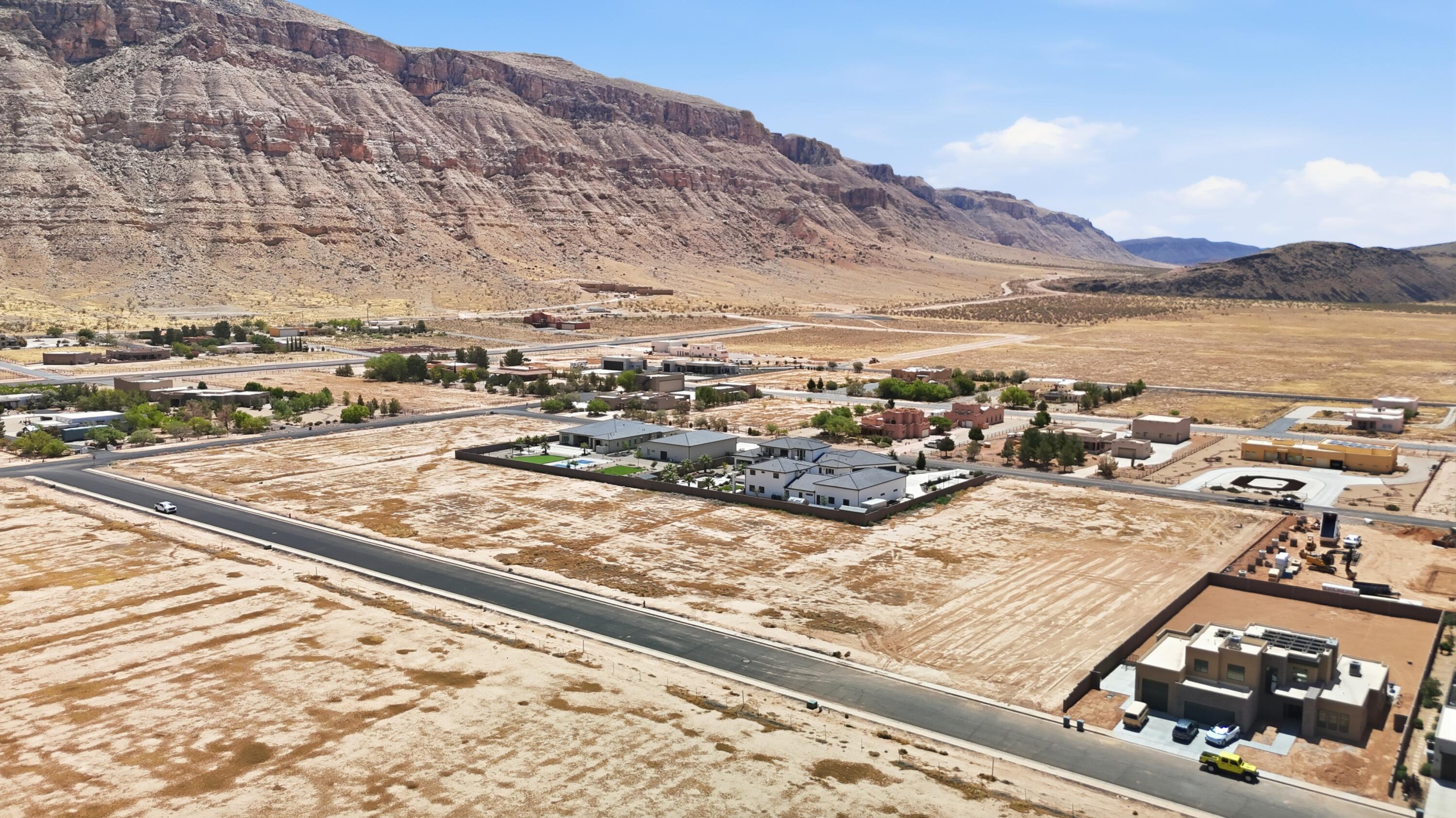 Come build your dream home in Southern Utah's desert playground! The water impact fee has already been paid, saving you thousands as you start your build! Nestled between Copper Rock Golf Course and the private airport community, Sky Ranch, this flat .55 acre lot is just minutes from some of Southern Utah's most iconic outdoor destinations: Sand Hollow and Quail Creek Reservoirs, Zion National Park, Snow Canyon, Tuacahn, Jellystone, and more. You'll enjoy quick access to adventure, recreation, and everything that makes Hurricane such a special place to live and vacation. Owner is a licensed Broker in Utah and related to other sellers. Buyer to verify all including all MLS information, county guidelines, & utilities.