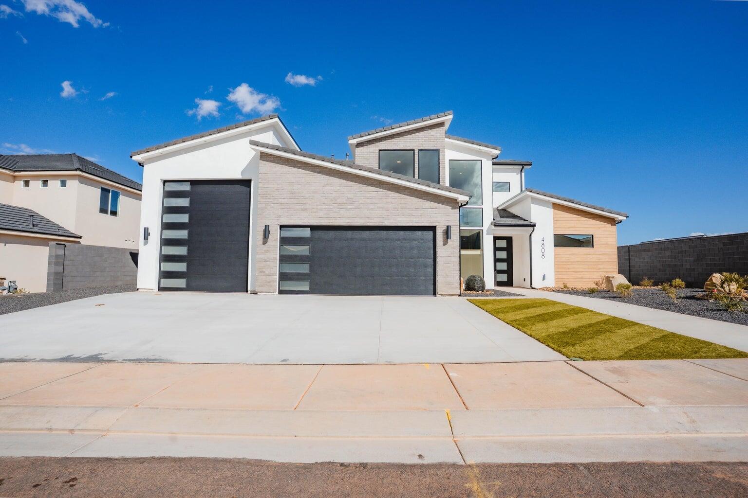 ~52' DEEP RV GARAGE~ 360 Degree Landscaping~ 

ANOTHER ONE BY BIG ROCK HOMES in the sought-after Sand Hollow Village.

 This home's stand out features is its massive 52-FOOT DEEP RV GARAGE (12' wide x 14' tall door)! Inside, you'll find an open-concept layout with LUXURY FINISHES, spacious bedrooms, and LARGE BACKYARD WITH ROOM TO ADD A POOL! 

-Ask about lender incentives!-

This property comes equipped with premium SMART HOME features including 3 wired in insecurity cameras and a door bell camera. Just minutes from Sand Hollow Reservoir, Sand Hollow Golf Course, the sand dunes, and Zion National Park, you're surrounded by year-round adventure -- boating, biking, hiking, off-roading, and more. Contact listing agent for PRIVATE SHOWINGS.
