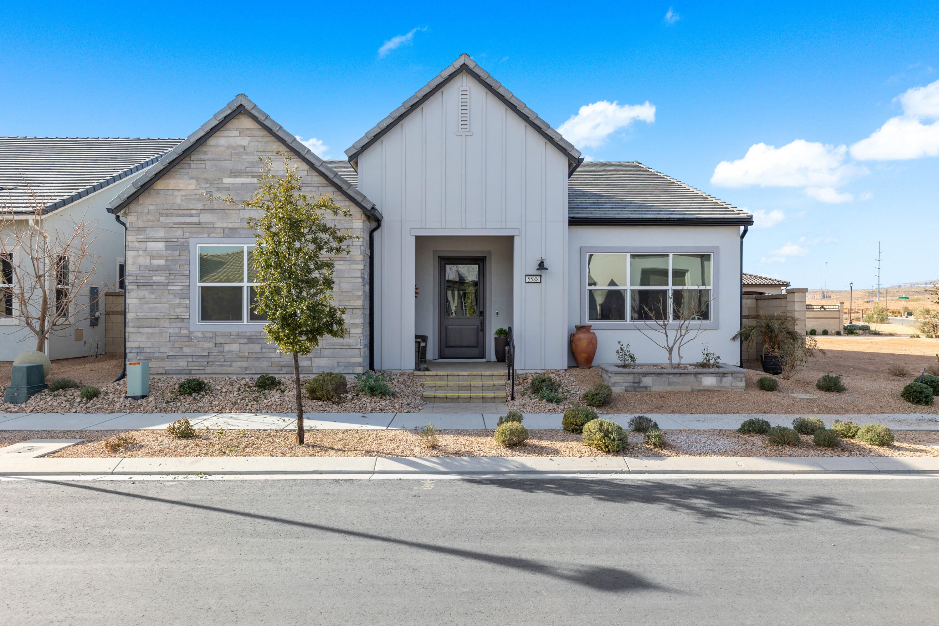 'Very Motivated Seller' your chance to get a great deal on a amazing home. Introducing a lightly-lived-in, single-level masterpiece built in 2024 by Toll Brothers, renowned for their luxury craftsmanship. This former model home spans 1,992 square feet and boasts $350,000 in premium upgrades, including expansive 12-foot sliding doors that seamlessly blend indoor and outdoor living spaces, an acoustically designed data center for the tech enthusiast, and a state-of-the-art solar energy system for sustainable living, Restoration Hardware luxury lighting fixtures, stunning quartz countertops throughout and KitchenAid stainless appliances. Situated in the highly desirable area of Desert Color, known for its stunning red rock landscapes and refreshing lagoon, this residence offers unparalleled luxury and modern conveniences in a highly desirable location.