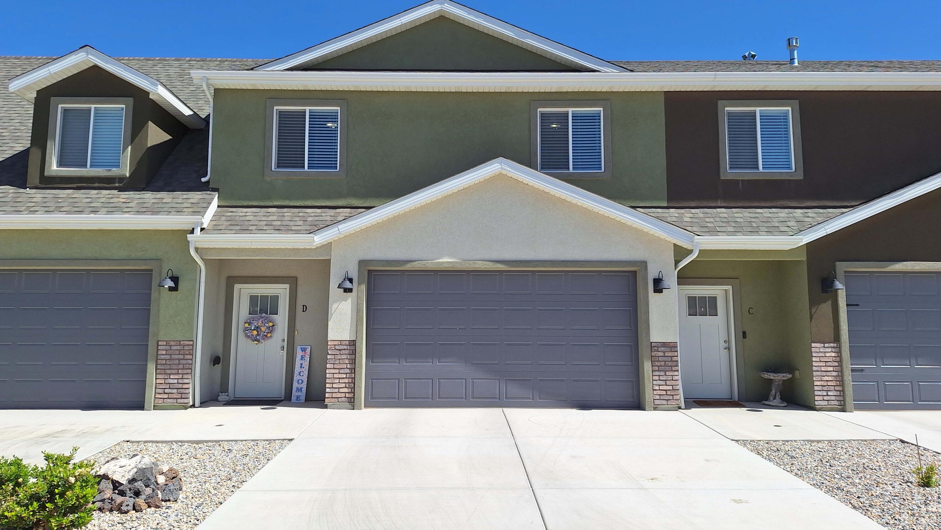 Welcome home to this newer townhome that has been exceptionally maintained and is in amazing condition. The open-concept main level is designed for comfortable living and entertaining, featuring a spacious kitchen, dining area, living room, and convenient half bathroom. Upstairs, you'll find three bedrooms, two full bathrooms, and a dedicated laundry room complete with washer and dryer included. A versatile loft area provides additional living space and can easily be transformed into a home office, reading nook, lounge area, or play space. The south side of the home offers stunning views of Cedar Mountain, while the back of the property overlooks open space and the valley beyond, creating a peaceful setting and added privacy. Whether you're looking for a primary residence, investment property, or low-maintenance lifestyle, this move-in-ready townhome offers the perfect combination of comfort, functionality, and scenic surroundings.