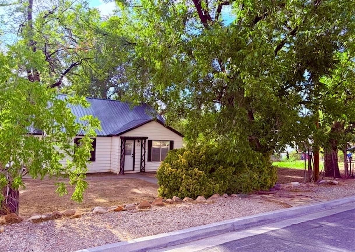 Charming Updated Home on Half an Acre in the Heart of La Verkin!!
Step back in time and discover the warmth and character of this delightful 3-bedroom, 1-bath home, originally built in 1943 and full of timeless charm but lots of upgrades! Situated on a spacious 0.47-acre flat lot, this property offers endless possibilities with plenty of room to garden, play, expand, or simply enjoy the peaceful surroundings.
The mature trees provide welcome shade and create a beautiful, established landscape, while two detached shed/workshops offer the perfect space for hobbies, storage, woodworking, or all your outdoor gear.
Nestled in a quiet, established neighborhood, this home combines small-town living with an unbeatable location. It's just a short walk to the local elementary school, making it convenient for families, and only minutes from some of Southern Utah's most sought-after attractions. Spend your weekends exploring the breathtaking beauty of Zion National Park or relaxing at the nearby Zion Canyon Hot Springs.

Whether you're searching for your first home, a weekend getaway, an investment opportunity, or simply a property with room to grow, this charming La Verkin gem offers comfort, character, and an exceptional location. Come experience the potential and make it your own!

Lots of upgrades:
New Roof - 2026
New AC / HVAC - 2026
All new flooring - 2026
Interior painted - 2026
New Black Plumbing - 2022
Updated electrical and panel