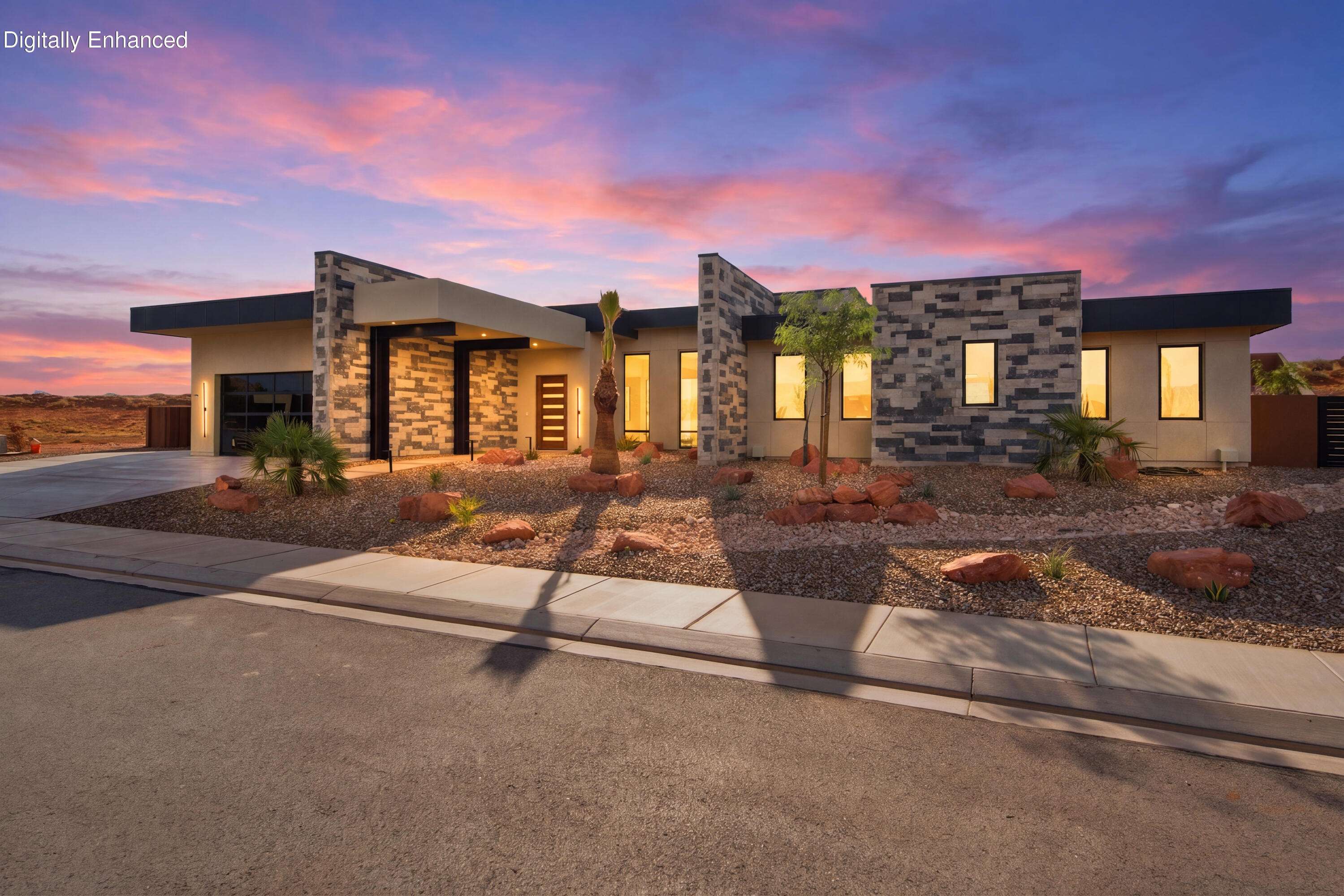 Newly completed by Jorgenson Builders, this exceptional luxury residence in The Estates at Sand Hollow Resort was thoughtfully designed to embrace Southern Utah's signature indoor-outdoor lifestyle. Expansive sliding glass doors open the great room seamlessly to the private backyard, while oversized pass-through kitchen windows connect effortlessly to the outdoor kitchen, creating an ideal setting for entertaining and everyday living.

Every detail showcases exceptional craftsmanship, from the solid wood doors, level-5 smooth drywall, and custom stone accents to the premium appliances, custom cabinetry, and high-performance construction. Engineered for year-round comfort and efficiency, the home features enhanced insulation, a five-zone HVAC system, ERV fresh-air system, smart-home Crestoron home lighting control, automated shades, sound system through out the home, and energy-efficient design throughout.

Designed for both relaxation and entertaining, the backyard is a true private retreat featuring a negative-edge pool and spa with a stunning spillover from the hot tub into the pool, an in-pool drink rail, outdoor kitchen, putting green, fire feature, outdoor shower, misting system, and an expansive covered patio thoughtfully positioned to provide shade and comfort from the desert sun. The HOA maintains the landscaping, allowing for a true lock-and-leave lifestyle with low-maintenance luxury.

Located within Sand Hollow Resort, residents enjoy championship golf, resort pools, fitness center, pickleball courts, walking trails, and convenient access to Sand Hollow Reservoir, Zion National Park, and endless outdoor recreation. Additional highlights include a flexible fitness or bonus room with buyer-selected flooring, an EV-ready garage, dedicated garage refrigeration power, a dog and bike wash station, and Wi-Fi-enabled garage doors.

This is more than a home, it's a lifestyle designed for relaxation, adventure, and effortless luxury.