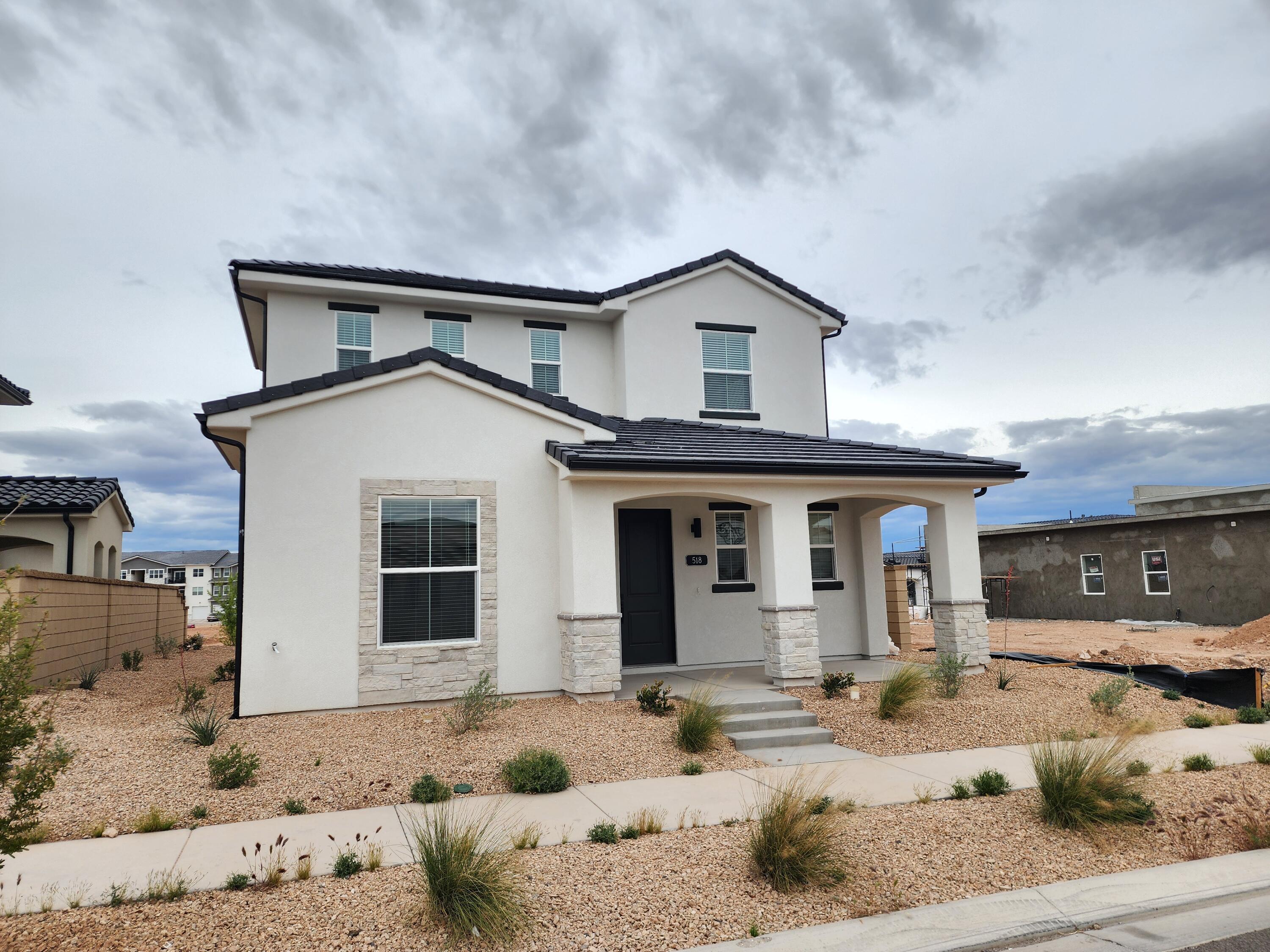 Welcome to your move-in ready home in the highly sought-after Desert Color, built by Holmes Homes, a builder known for thoughtful design and elevated finishes.
This beautifully crafted Marina home design offers the perfect blend of style, comfort, and functionality. From the moment you step inside, you'll notice the open-concept layout, abundant natural light, and carefully selected finishes that create a warm yet modern feel. Designed with everyday living in mind, the space flows effortlessly, making it ideal for both relaxing and entertaining.
Located in one of St. George's most vibrant master-planned communities, you'll enjoy access to resort-style amenities including the lagoon, pools, walking trails, and more, all just steps from your door.