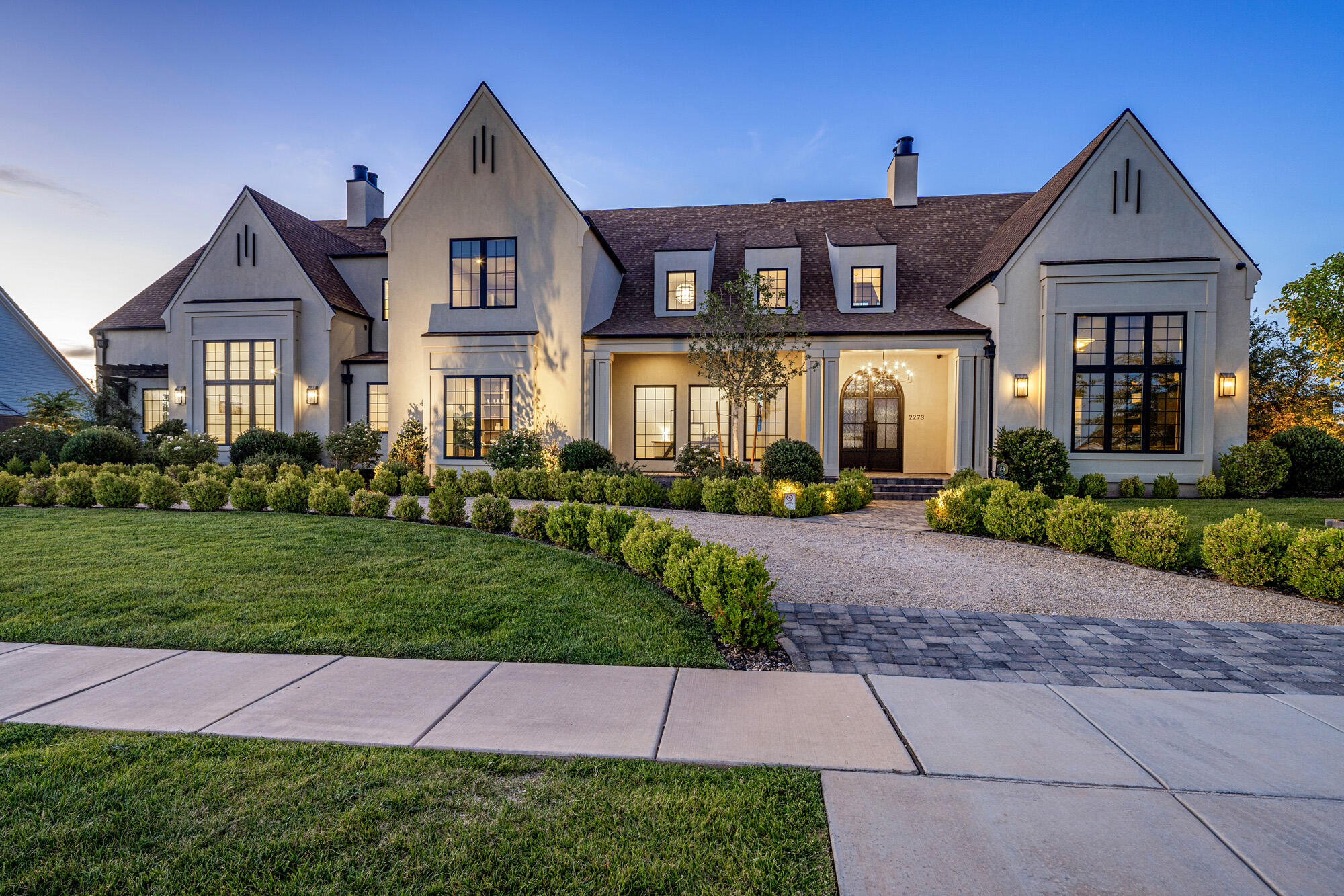 A home designed for gathering, entertaining, and living beautifully. Set on a full acre in the heart of Little Valley, this builder-designed estate blends timeless European-inspired architecture with thoughtful modern luxury and incredible character throughout.

Vaulted wood-beam ceilings, Andersen windows, abundant natural light, and warm designer finishes create a peaceful yet sophisticated atmosphere. The chef's kitchen features leather-honed quartzite countertops, custom cabinetry, a butler's pantry, and walk-in pantry, opening seamlessly to formal and casual living spaces centered around a beautiful wood-burning fireplace.

The primary suite offers a private retreat with its own fireplace, spa-inspired bath, and expansive his-and-hers closets. The home also includes 5 bedrooms, an office, theater room, 4 full baths, and 4 half baths, including a dedicated pool bath designed for seamless indoor-outdoor living.

Built with exceptional craftsmanship and designed for modern convenience, the fully integrated smart-home system allows you to control lighting, security, TVs, garage doors, pool features, and the incredible interior/exterior sound system directly from your phone.

In addition to the attached 6-car garage, the property features an approximately 2,500 sq ft detached climate-controlled RV garage (not included in total square footage) complete with heating and air conditioning, bathroom, sink, refrigerator, lounge space, custom cabinetry, and extensive storage. With existing plumbing and amenities already in place, the space could easily be converted into a private casita or mother-in-law suite for multi-generational living.

The backyard was built for entertaining with a fully equipped outdoor kitchen, fire pit, fountain water feature, sports court, garden beds, paver patios, and mature vines creating a private resort-style setting. Chickens and up to 2 horses are permitted. A rare opportunity to own a one-of-a-kind estate designed to host unforgettable gatherings while still feeling warm, comfortable, and truly like home. Call today for a private showing.