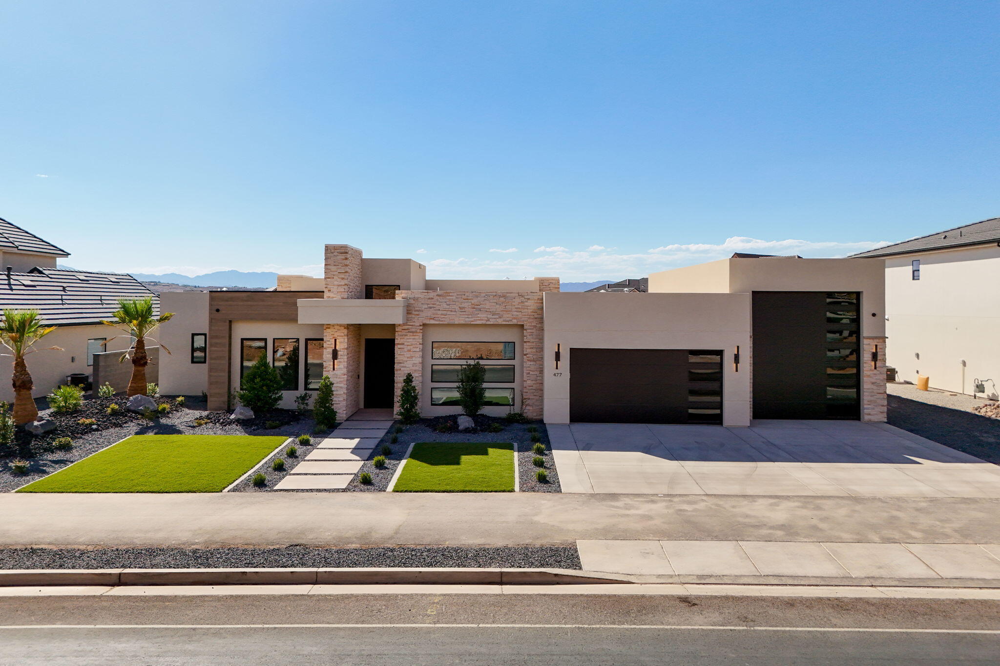 Discover an exceptional New Home in the Finley Farms community in Washington City! This home has been carefully crafted with attention to every detail including 2x6 construction & extra insulation for efficiency.
Stay comfortable year-round with a 3-zone high-efficiency HVAC system,  energy-efficient windows. Designed to stand up to Southern Utah's climate keeping energy costs in check. Two elegant built-in electric fireplaces, one in the living are & primary bedroom. The kitchen includes a sleek built-in refrigerator freezer combo, built in gas range, hood, spacious pantry  for a truly custom feel. Features wide halls & 3-foot handicap-accessible doors throughout.
Bring your RV, Boat, Trailer & or Toys to the oversized RV garage. It offers a generous clearance - 47ft x 15.5ft wide x 14ft tall. This could also be the ultimate workshop setup.
Taxes are estimated by the seller as this is a new build.