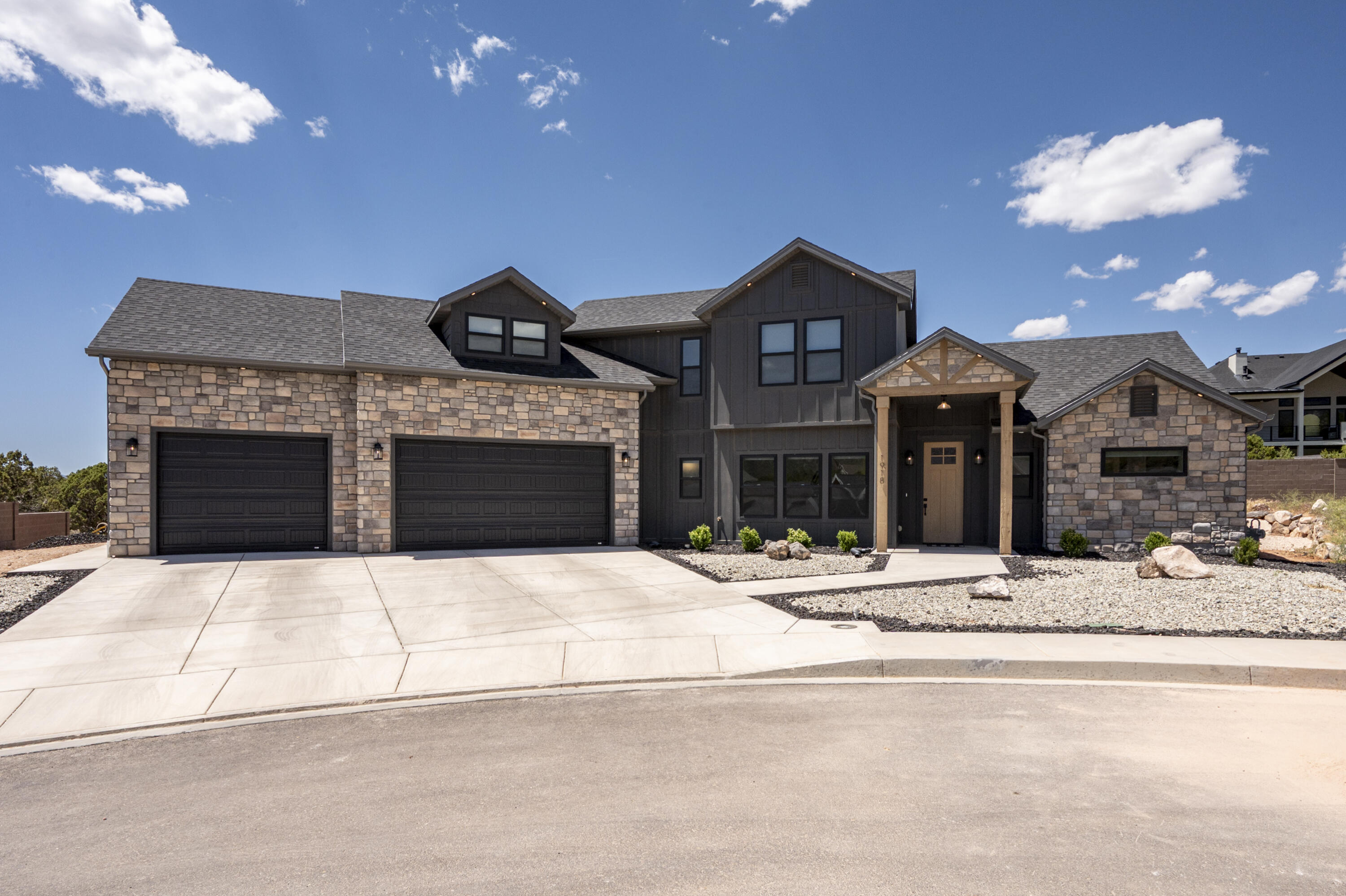 Located in the Saddleback Ridge community, these almost new residence presents a refined balance of clean design and everyday livability. Offering 2,450 square feet, the home features 4 bedrooms, 2.5 bathrooms, and an oversized 3-car garage, providing generous space for vehicles, storage, or a customized hobby area. The interior layout has been carefully curated to feel both open and intentional, with each space flowing naturally into the next. At the center of the home, the kitchen stands out with quartz surfaces, custom cabinetry, and a polished finish that feels both current and timeless. Range is electric but also plumbed for gas. It connects seamlessly to the main living and dining areas, creating an inviting setting whether hosting guests or enjoying a quiet night in.