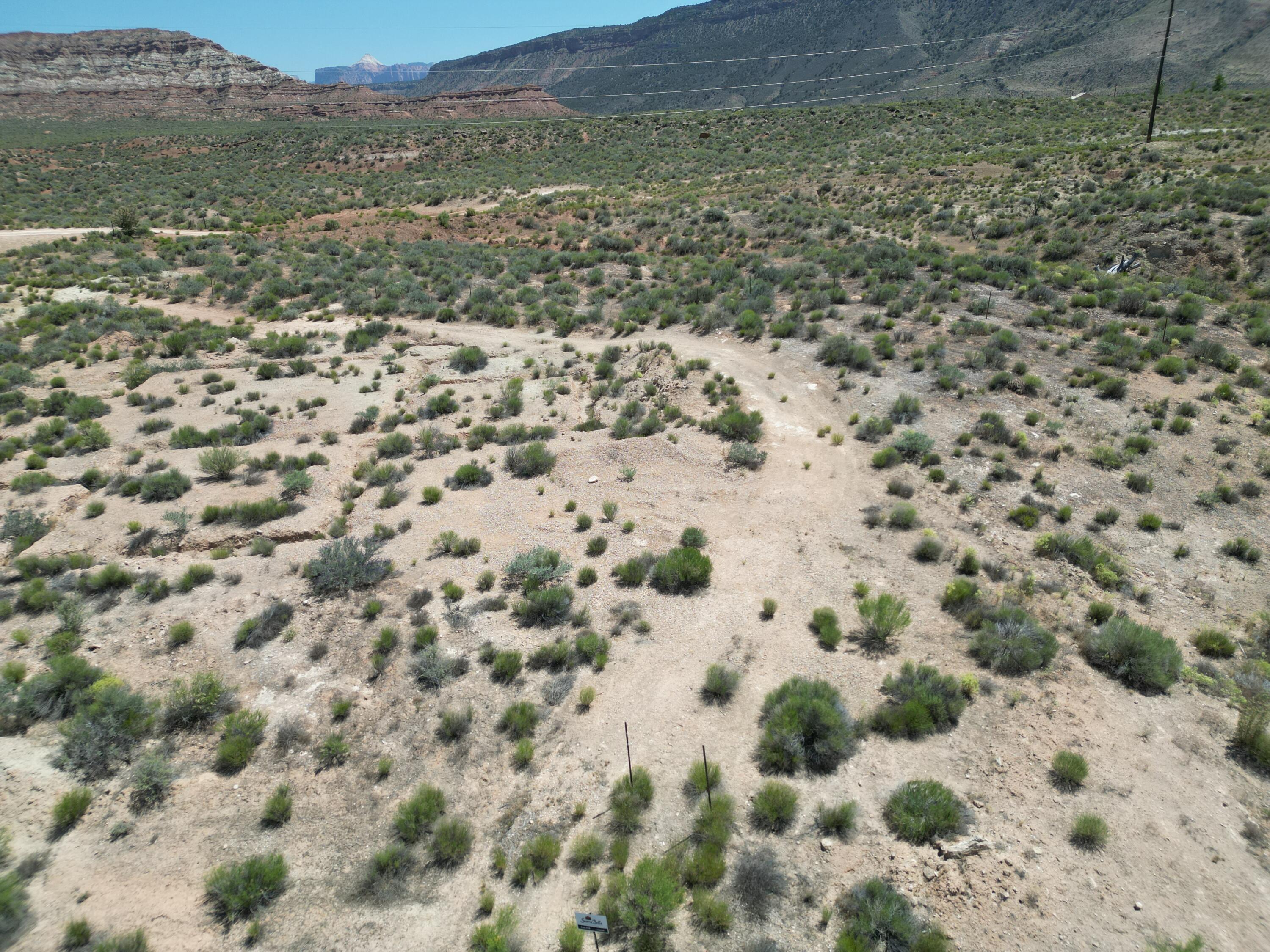 New Release - Phase 3 Premium 1+ Acre Lots Now Available!
Welcome to Sierra Bella in Virgin, Utah, where luxury rural living meets the breathtaking beauty of Southern Utah. Visit our brand-new sales office and discover an exceptional opportunity to own a fully improved estate-sized homesite just minutes from the entrance of Zion National Park.
These premium 1+ acre homesites offer spectacular panoramic views of Zion's iconic red rock mesas and provide the perfect setting for your custom dream home. 
Each Homesite Includes:
• One share of pressurized irrigation water
• Culinary water connection
• Fully improved lot
• Washington County Water Conservancy impact fees already paid
Prices Starting at $565,000
Sierra Bella offers a rare combination of privacy, natural beauty, and modern conveniences in one of Southern Utah's most desirable communities.
It is Nestled in the heart of the Zion Canyon region at approximately 3,600 feet in elevation, Virgin is renowned for its stunning landscapes, dark night skies, and unmatched access to outdoor recreation. Residents enjoy nearby hiking, biking, ATV trails, horseback riding, and endless opportunities to explore Southern Utah's spectacular scenery.
The area is known for:
• Sweeping views of Zion National Park and surrounding mesas
• Ranch properties and rich agricultural heritage
• Dark skies perfect for stargazing
• World-class outdoor recreation
• A peaceful rural lifestyle with convenient access to modern amenities
The surrounding landscape has served as the backdrop for numerous films, commercials, and outdoor recreation productions, showcasing the area's extraordinary natural beauty.
This location is one of Southern Utah's most scenic gateway communities while preserving its historic charm, rural character, and welcoming atmosphere.
Don't miss this limited opportunity to secure your place in Southern Utah paradise.
All information deemed reliable but not guaranteed. Buyer is responsible for independently verifying all inf