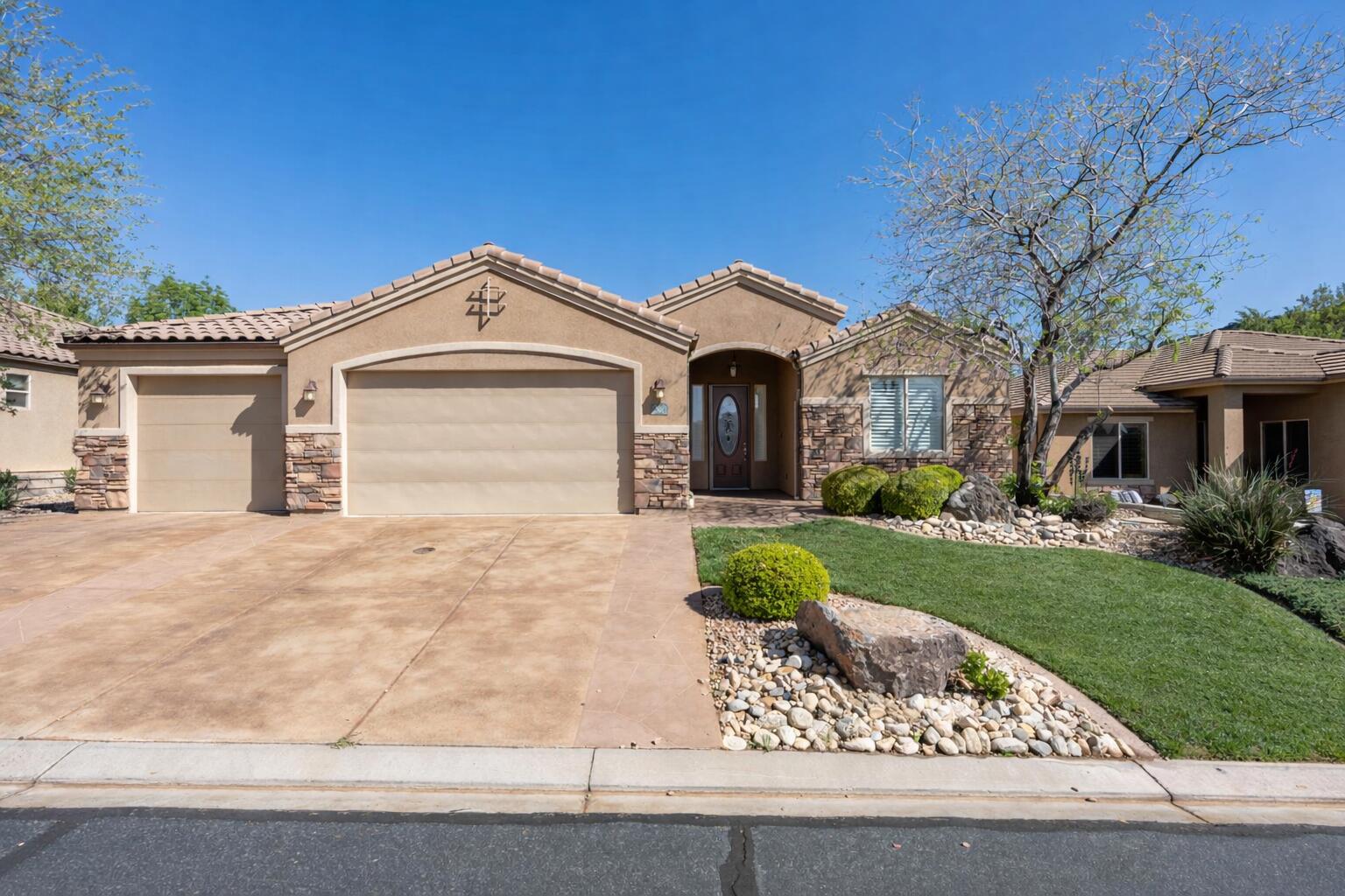 Beautiful single-level home in the desirable Olive Grove Community! This 3-bed, 2-bath home sits on a spacious .25-acre lot and features an open-concept layout with abundant natural light. The kitchen, which offers granite countertops, rich wood cabinetry, and a large kitchen island is perfect for hosting and flows into the main living area. Tile flooring throughout main spaces adds easy maintenance and a sleek appearance. Enjoy the private, fully fenced backyard with a covered patio and mature landscaping, perfect for relaxing or entertaining. Additional features include a 3-car garage and a spacious primary suite with dual vanities and a separate tub. Conveniently located near shopping, dining, and outdoor recreation.