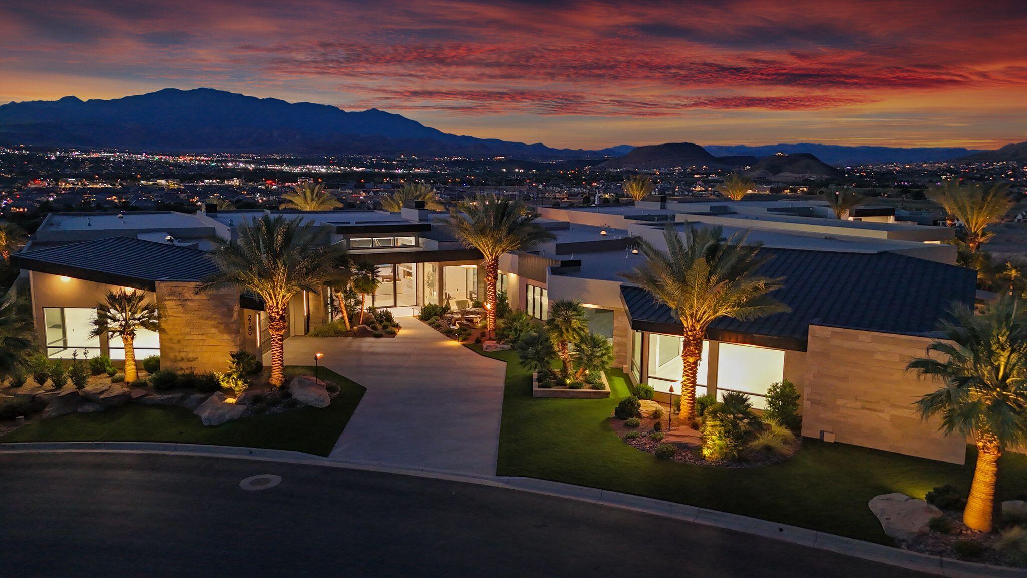 Welcome to The Rendezvous-an extraordinary luxury estate where timeless design, exceptional craftsmanship, and resort-inspired living converge. Located within the prestigious gated community of Stone Cliff, this remarkable residence represents one of Southern Utah's most distinguished properties.


Spanning an impressive 9,880 square feet on a single level, this thoughtfully designed estate offers 6 spacious bedrooms, 8 luxurious bathrooms, and an unparalleled living experience where every detail has been carefully curated.


At the heart of the home is a spectacular chef's kitchen featuring dual oversized islands, custom cabinetry, and a full suite of Sub-Zero and Wolf appliances. Entertain effortlessly with the adjoining butler's/prep kitchen complete with a Wolf induction cooktop, dishwasher, prep sink, and additional workspace--perfect for hosting gatherings of any size.

The primary suite is a true private sanctuary, offering a peaceful retreat unlike any other. The expansive primary closet is a showpiece of its own, featuring custom built-in cabinetry, a large center island, and a discreet walk-in safe. The spa-inspired primary bath elevates everyday living with heated floors, a steam shower, private sauna, soaking tub, and an oversized walk-in shower, creating a five-star wellness experience at home. A dedicated fitness room completes the owner's private retreat.


Designed for both grand entertaining and everyday enjoyment, the backyard is a destination unto itself. A stunning 25' x 45' custom in-ground pool with integrated spa and automatic cover serves as the centerpiece, while the fully equipped outdoor kitchen features a built-in BBQ, grill, and pizza oven for unforgettable outdoor dining. A putting green, built-in misting system, and beautifully landscaped grounds create the ultimate private resort atmosphere. Car enthusiasts and adventurers alike will appreciate the incredible climate-controlled garage, highlighted by a full-size RV garage with a 14-foot door, 220-volt power, sewer clean-out, and a dedicated "Man Cave" lounge--an exceptional space that is as functional as it is impressive.

Modern luxury meets intelligent living with a fully integrated Control 4 Smart Home system providing seamless control of audio and home automation throughout the property.

Offered fully furnished with professionally designed interiors and complete landscaping, The Rendezvous presents an exceptionally rare turnkey opportunity.

From its expansive single-level design and world-class amenities to its premier location within Stone Cliff, The Rendezvous is more than a home--it's a private luxury resort and one of the finest residential offerings in all of Southern Utah.