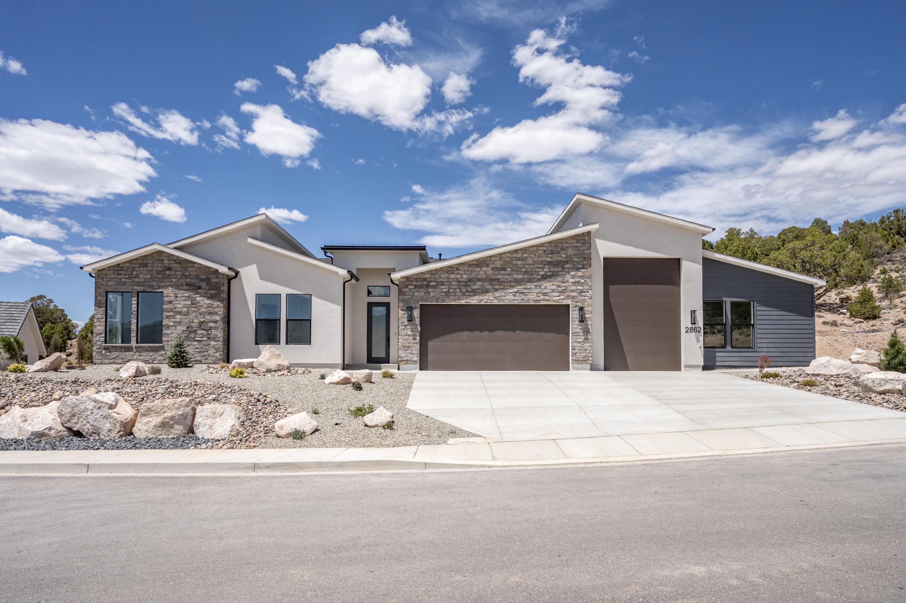 Brand New and FINISHED! Check out this home in the highly desired subdivision of Saddleback Ridge! The main home features 2307 sq ft all on one level, 4 bed, 3 bath and the casita consists of 366 sq ft 1 bed 1 bath. The garage boasts an oversized 2 car and 45 ft deep RV parking. The home sits on a large .44 acre lot! This home has everything that you could want at a great price! The property is turn key with the front and backyard landscaping already finished. The home has many upgrades with some of those including tankless water heater, 10+ ft ceiling height, tile throughout, 8 ft doors, and high grade granite countertops. The home faces east to capture the beautiful shurtz canyon views but also has seclusion and privacy in the backyard with backing up to the hill. Come see today!