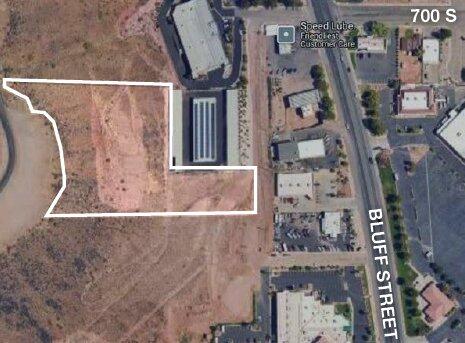 Seller Financing potential. Commercial land across Bluff Street from old Kmart.  This prime terrace land offers stunning city views and is surrounded by thriving retail businesses, hotels, and office spaces. Utilities, including electricity, are conveniently located nearby. Potential uses for the property include retail, office space, or outdoor storage. This prime terrace land offers stunning city views and is surrounded by thriving retail businesses, hotels, and office spaces. Utilities, including electricity, are conveniently located nearby. Potential uses for the property include retail, office space, or outdoor storage. The yard may also be fenced for added security and privacy.