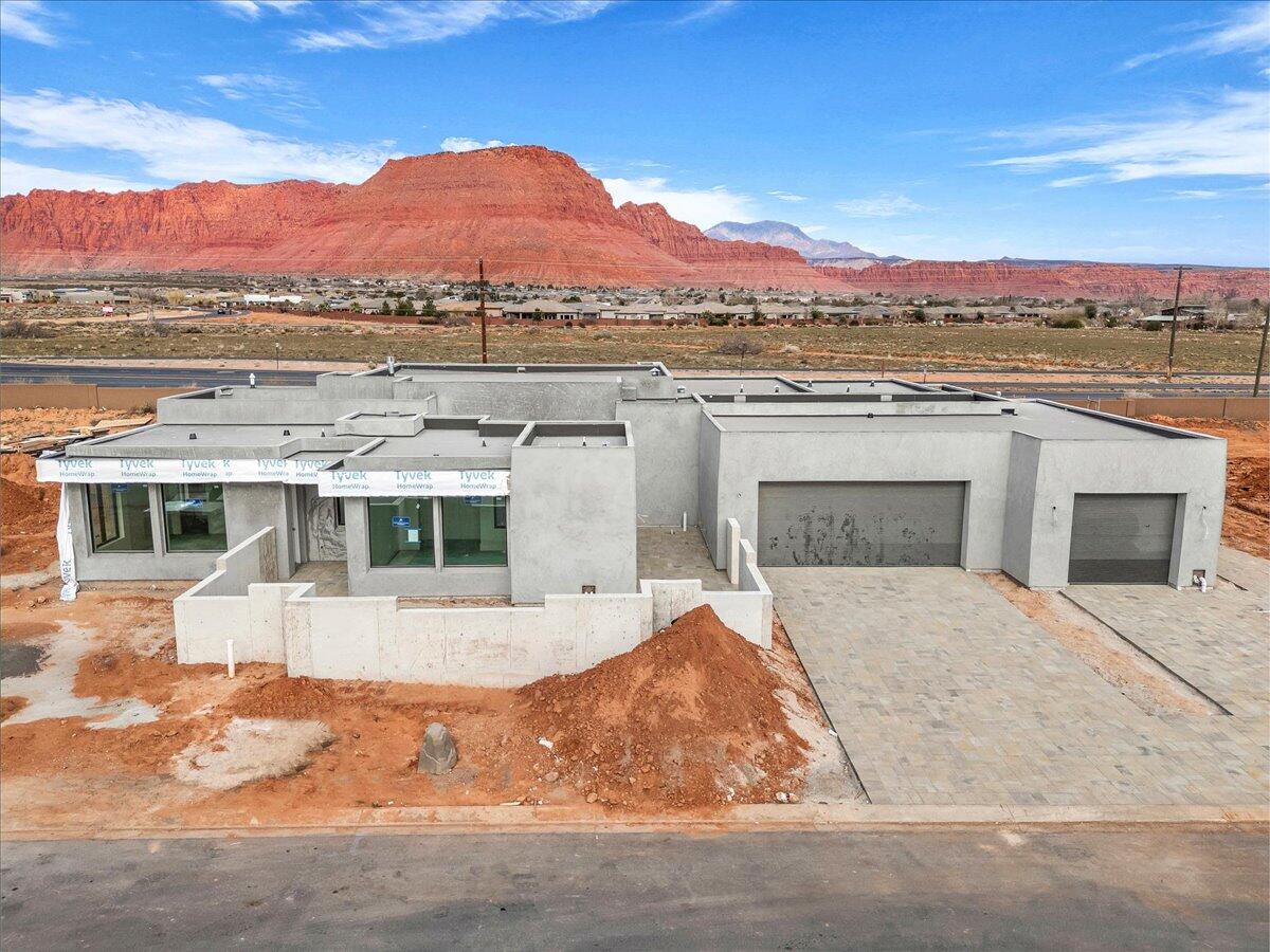 Experience luxury living in this brand new home showcasing breathtaking Red Mountain views with private pool. The open concept living is perfect for entertaining. All four bedrooms feature their own ensuite bath. A separate casita with exterior entrance offers ideal space for guest or multigenerational living. Thoughtfully designed with high end finishes and modern elements. This exceptional property offers the ultimate luxury living experience.