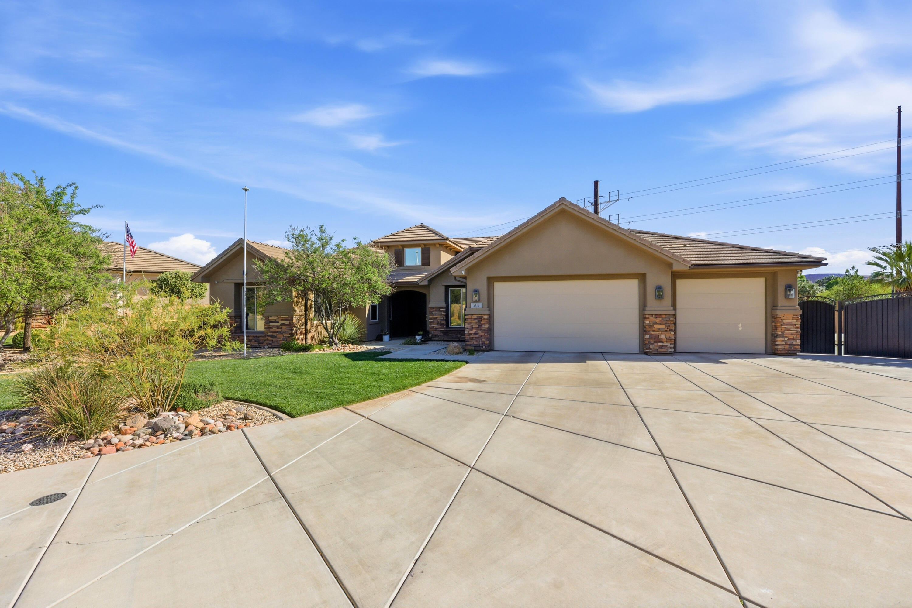 Discover the perfect blend of convenience and comfort in this centrally located St. George gem. Set on an expansive .42-acre lot, this inviting four-bedroom, two-bath home gives you room to breathe while keeping you minutes from restaurants, shopping, and work. Inside, granite countertops and an open, livable layout make everyday life effortless. The oversized three-car garage offers plenty of space for vehicles and toys, with additional side-yard parking for RVs, trailers, or guests. Step outside to your private backyard oasis featuring a sparkling pool--ideal for those warm Southern Utah summers. Nestled in a friendly, well-established neighborhood with low HOA dues, this home delivers the rare combination of space, location, and value that's hard to find in the heart of St. George.