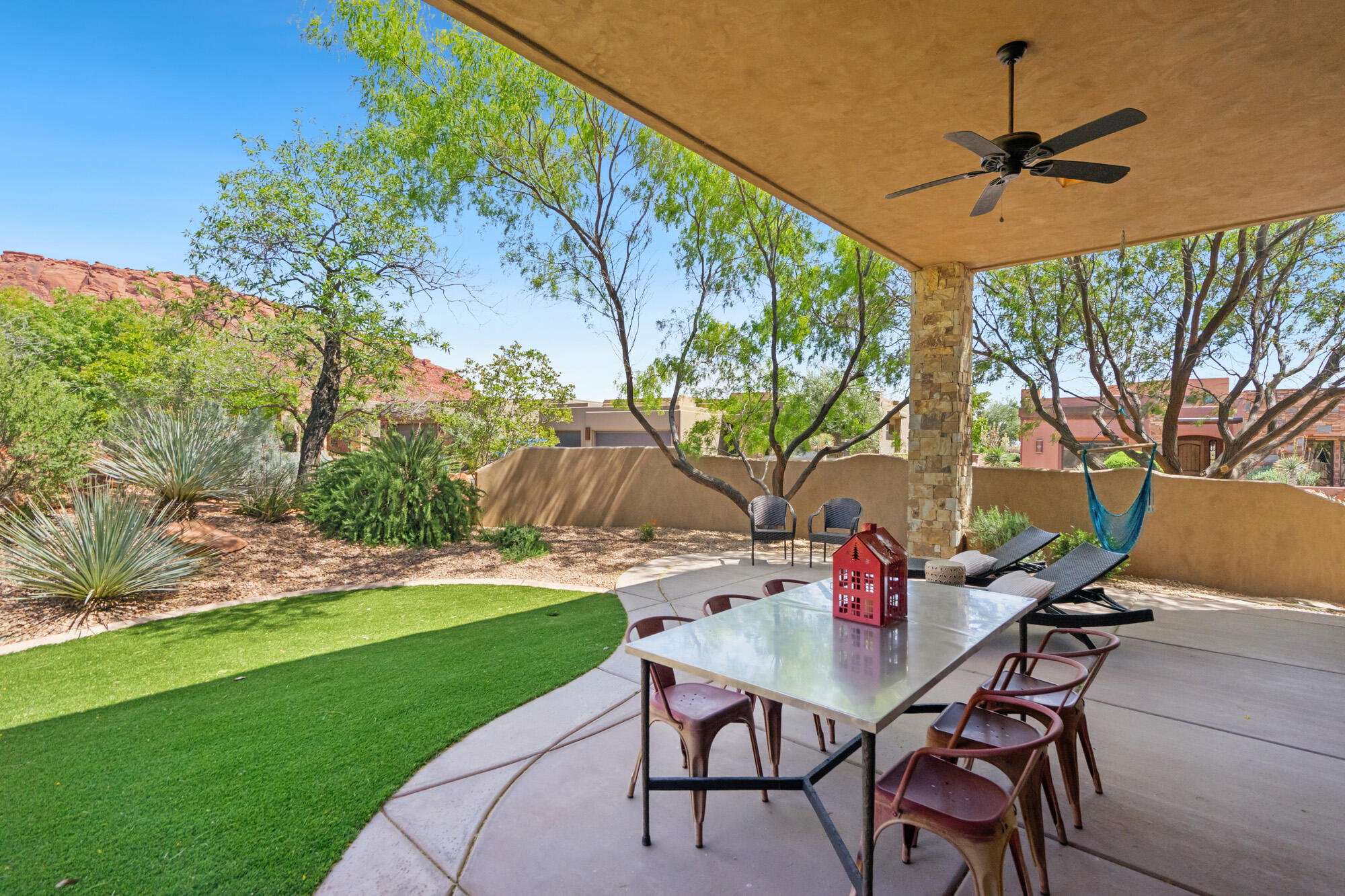 Own a beautiful luxury home in The Cliffs of Snow Canyon located very close to the Cliffs amenities for you or family to enjoy! The pools, hot tub, exercise room, and entertainment/meetings/kitchen for family gatherings, meetings, etc., are right down the street for easy access!

The HOA's in The Cliffs are such a value compared to other Entrada communities -- now at $250/month.

This home has stunning views from the main living area of Kachina Cliffs, as well as views from front of home towards Johnson Arch and Snow Canyon. The home also has common area behind the home with the landscaping creating a private backyard appeal. 

The main living area and gourmet kitchen create that luxury feeling for all to enjoy. This home has 4 bedrooms and 3 bathrooms - plenty of room for family and guests to enjoy the ever popular Cliffs of Snow Canyon Subdivision.

As you step through the front door or into the detached casita, you will indulge yourself in upscale living!

The Cliffs currently has the option of joining the Entrada Country Club or not - this makes it a very appealing property to own!