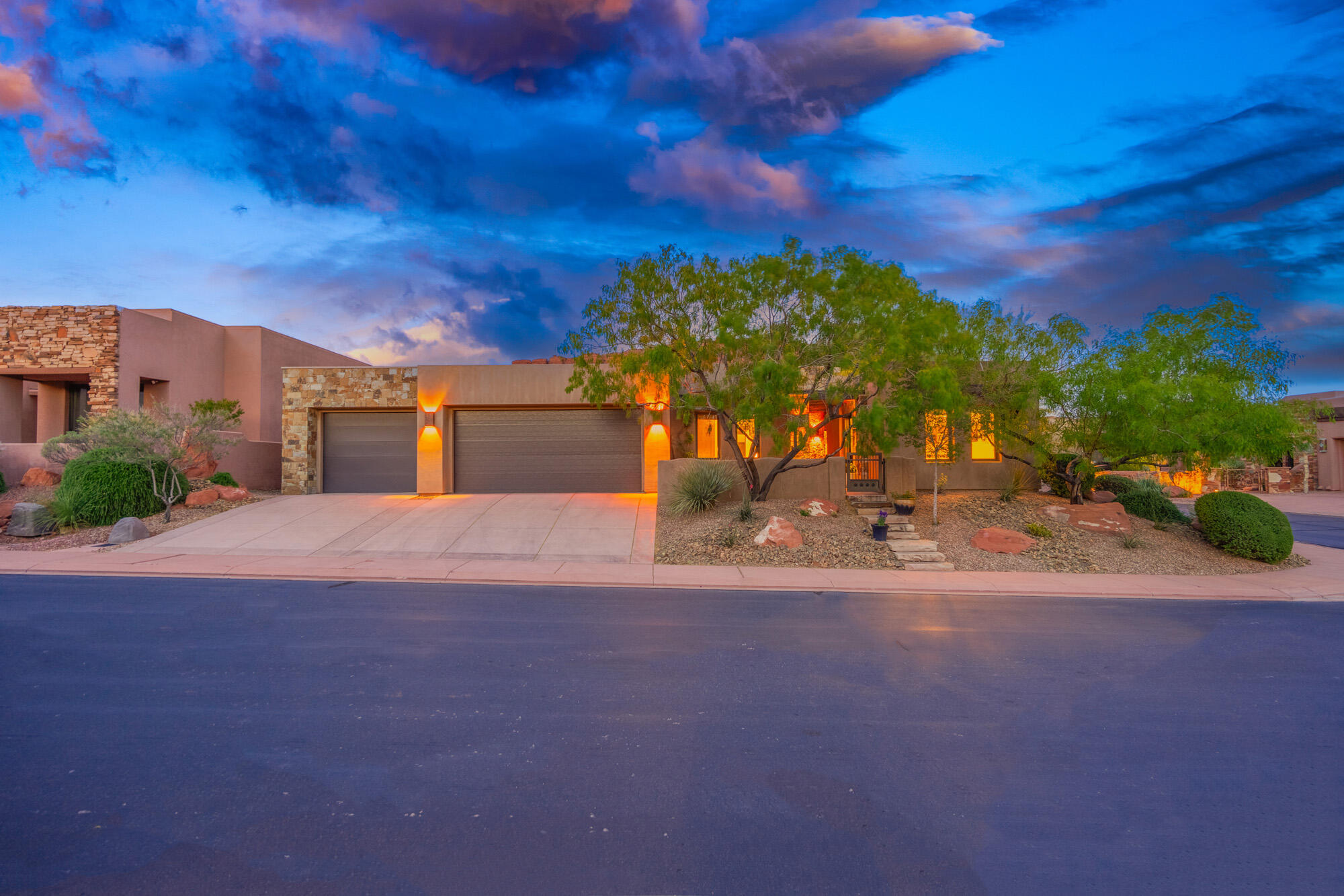 Own a beautiful luxury home in The Cliffs of Snow Canyon located very close to the Cliffs amenities for you or family to enjoy! The pools, hot tub, exercise room, and entertainment/meetings/kitchen for family gatherings, meetings, etc., are right down the street for easy access!

The HOA's in The Cliffs are such a value compared to other Entrada communities -- now at $250/month.

This home has stunning views from the main living area of Kachina Cliffs, as well as views from front of home towards Johnson Arch and Snow Canyon. The home also has common area behind the home with the landscaping creating a private backyard appeal. 

The main living area and gourmet kitchen create that luxury feeling for all to enjoy. This home has 4 bedrooms and 3 bathrooms - plenty of room for family and guests to enjoy the ever popular Cliffs of Snow Canyon Subdivision.

As you step through the front door or into the detached casita, you will indulge yourself in upscale living!

The Cliffs currently has the option of joining the Entrada Country Club or not - this makes it a very appealing property to own!