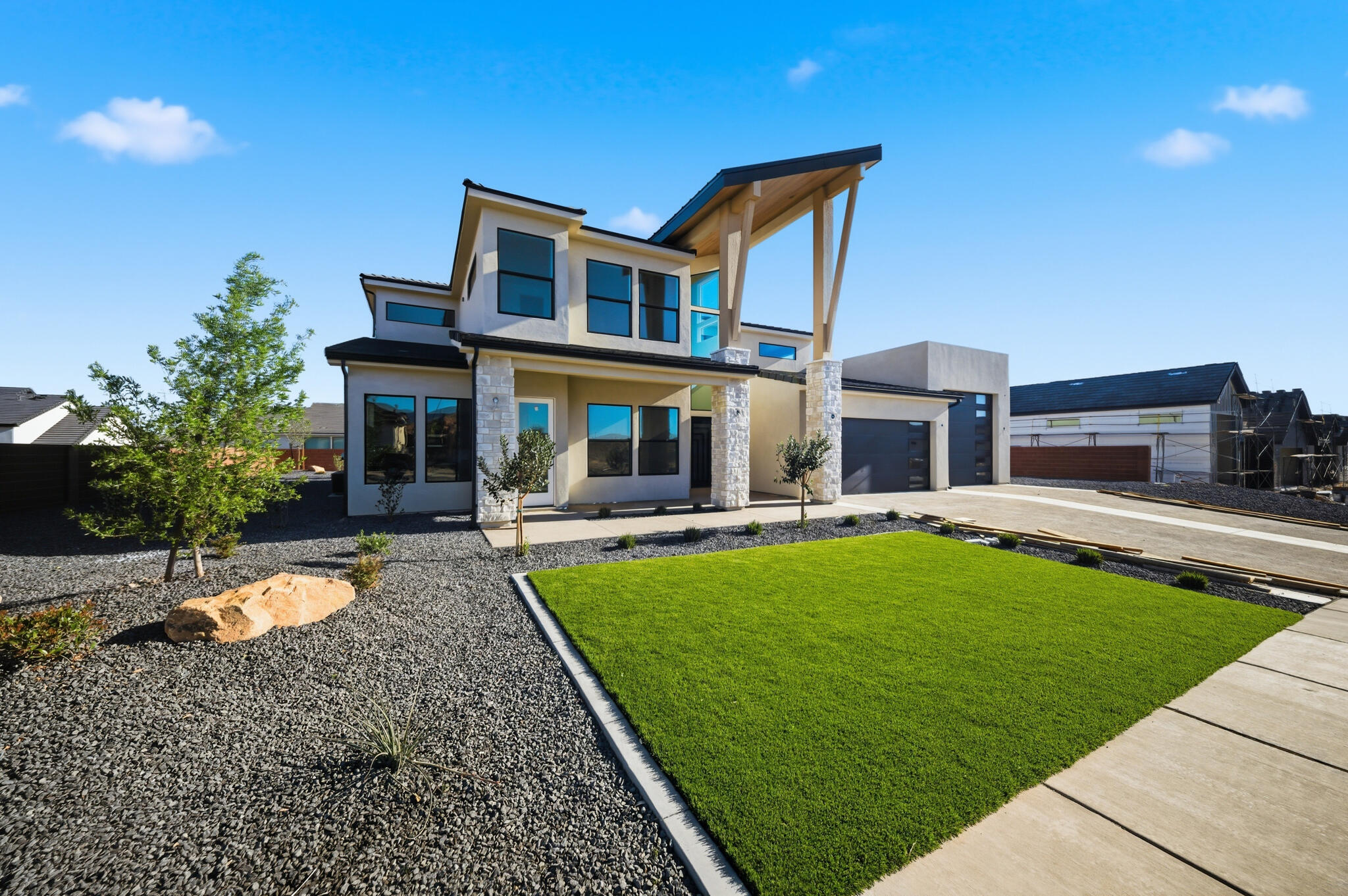 Striking new construction with modern design and flexible living spaces. This 5 bed, 4.5 bath home features an attached casita ideal for guests or potential rental income. A 2-car garage plus oversized RV/boat garage and additional parking offer exceptional functionality. The thoughtfully designed layout includes an extra upper-level family room, a dedicated theatre, and a spacious primary suite with a second laundry area. Enjoy seamless indoor-outdoor living with a covered deck and patio, perfect for entertaining or relaxing. A rare combination of style, space, and versatility in a beautifully designed spec home! Outdoor living is equally impressive with a covered deck and patio, perfect for relaxing or hosting gatherings while enjoying the surrounding views. Clean architectural lines, modern finishes, and a well-planned layout make this home as functional as it is striking.
A rare combination of design, space, and versatility this home is built to support the way you live today.