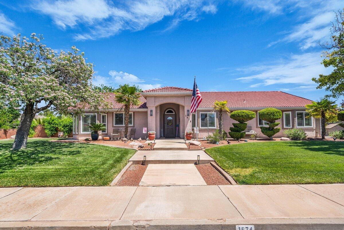 Don't miss this beautifully maintained home offering comfort, style, and thoughtful updates throughout. Ideally located just down the street from Snake Hollow Bike Park and Snow Canyon Middle and High School, it provides both convenience and access to some of the area's best recreation and schools. The exterior showcases outstanding curb appeal with mature trees and beautifully landscaped grounds that create a warm and inviting first impression. Inside, the open-concept kitchen, dining, and living areas are filled with natural light from abundant windows, complemented by tall, vaulted ceilings that enhance the spacious feel. All windows were replaced in 2025, paired with new plantation blinds, adding a fresh, modern touch throughout the home. The private backyard is a true retreat, featuring a secluded setting with a 14-foot swim spa, a gazebo complete with blinds and a fan, and gem lights along the roofline for added evening ambiance. Additional highlights include a large driveway and new WiFi-enabled garage motor equipment for everyday convenience. Buyer to verify all information, deemed reliable, however buyer to verify all info including utilities, rental restrictions, and HOA information if applicable.