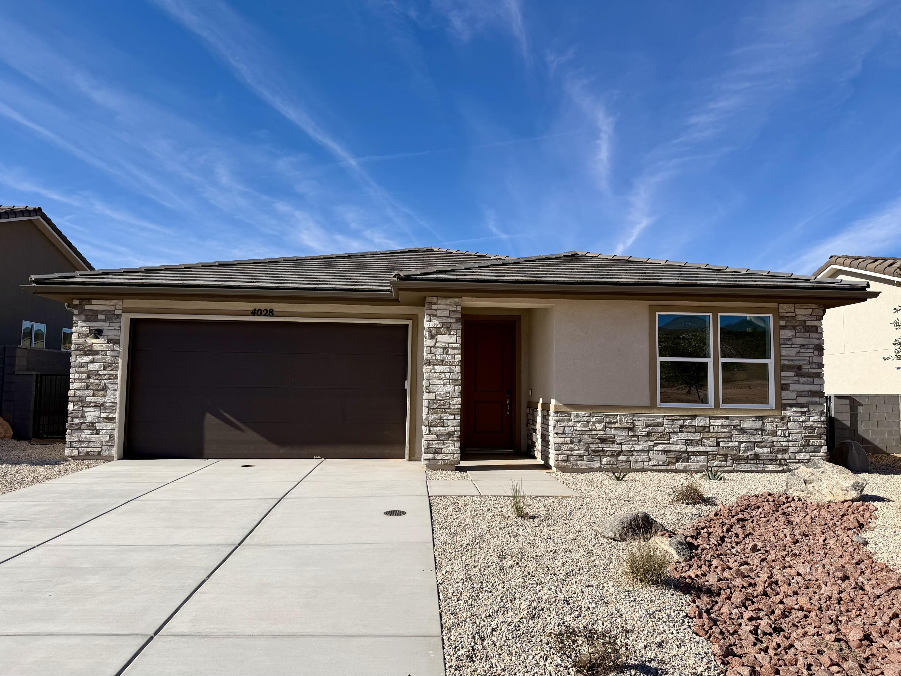 Special Financing Available as low as 3.99%.  Call for details.
Find your dream home at Cordero! Nestled between Copper Rock and Southern Shores, this exciting Hurricane community offers impressive desert and mountain scenery, with ample outdoor recreation opportunities at nearby golf courses and Sand Hollow State Park. Right off Southern Parkway, residents will enjoy easy access to the shopping, dining, entertainment and employers. The neighborhood showcases an inspired array of designer-curated homes, each boasting a flexible layout and the in-demand features today's homebuyers are seeking. This home includes a spacious kitchen family room area with fireplace and covered patio.