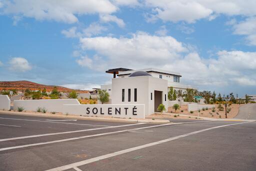 Welcome to Lot 205 in Solenté, Washington City's newest gated community! Nestled in the exclusive La Parea neighborhood, this homesite offers the chance to build your dream estate surrounded by club amenities and stunning red rock views. Solenté features 12 custom estate lots in Phase 2A, ranging from .18 acres to 1+ acres. Residents enjoy private club membership with luxury pools, dining, wellness, pickleball courts, and trail access. Bring your own builder or choose from Solenté's trusted partners to create a home tailored to your lifestyle. This is more than just a lot-it's an opportunity to be part of a community unlike anything Southern Utah has ever seen.