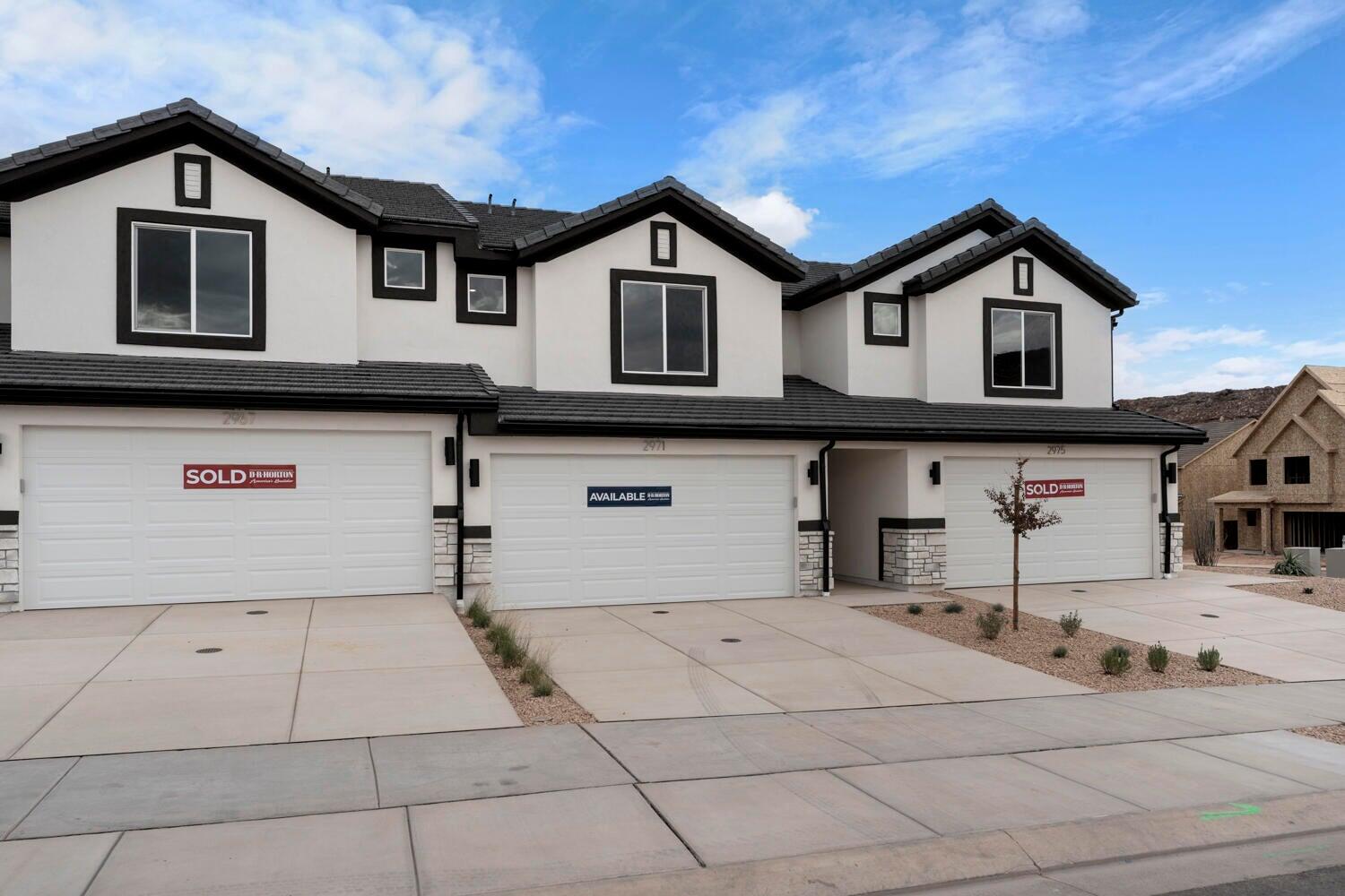 END UNIT WITH VIEWS!!!! Featured in our popular Traditional exterior, this MILLBROOK floor plan is featured in the desirable community of Long Valley. You will enjoy an open floorplan that boasts a kitchen with generous pantry, large kitchen island with breakfast bar, quartz counters, stainless appliances, and laminate flooring throughout the main level. You also have a backyard patio! Enjoy our splash pad, community pools, hot tub, pickleball courts, 18 hole putting course and more! Ask me about our generous home warranty and smart home package! $4,000 toward closing costs when you use our preferred lender DHI Mortgage.