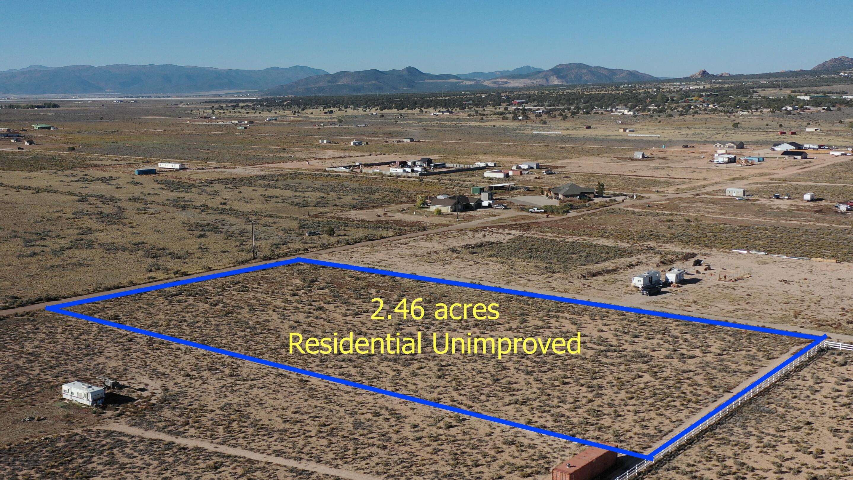 Escape the chaos and find your place on this 2.46-acre lot located near the Three Peaks Recreation Area, just minutes from Cedar City and Enoch.  This property offers the best of both worlds-wide-open skies, peace, and privacy, yet close enough to town for quick access to modern conveniences. 
With .73 acre-feet of water included, this parcel is ready for your vision-- whether it's a getaway cabin, full-time residence, or recreational retreat.  City water and sewer lines are located approx. 400 feet from the property, giving you flexibility for future connections while maintaining that off-grid feel.  
Enjoy stunning sunsets, endless stars and the freedom to make this land your own--all within reach of trails, open space and the best of Southern Utah recreation.
