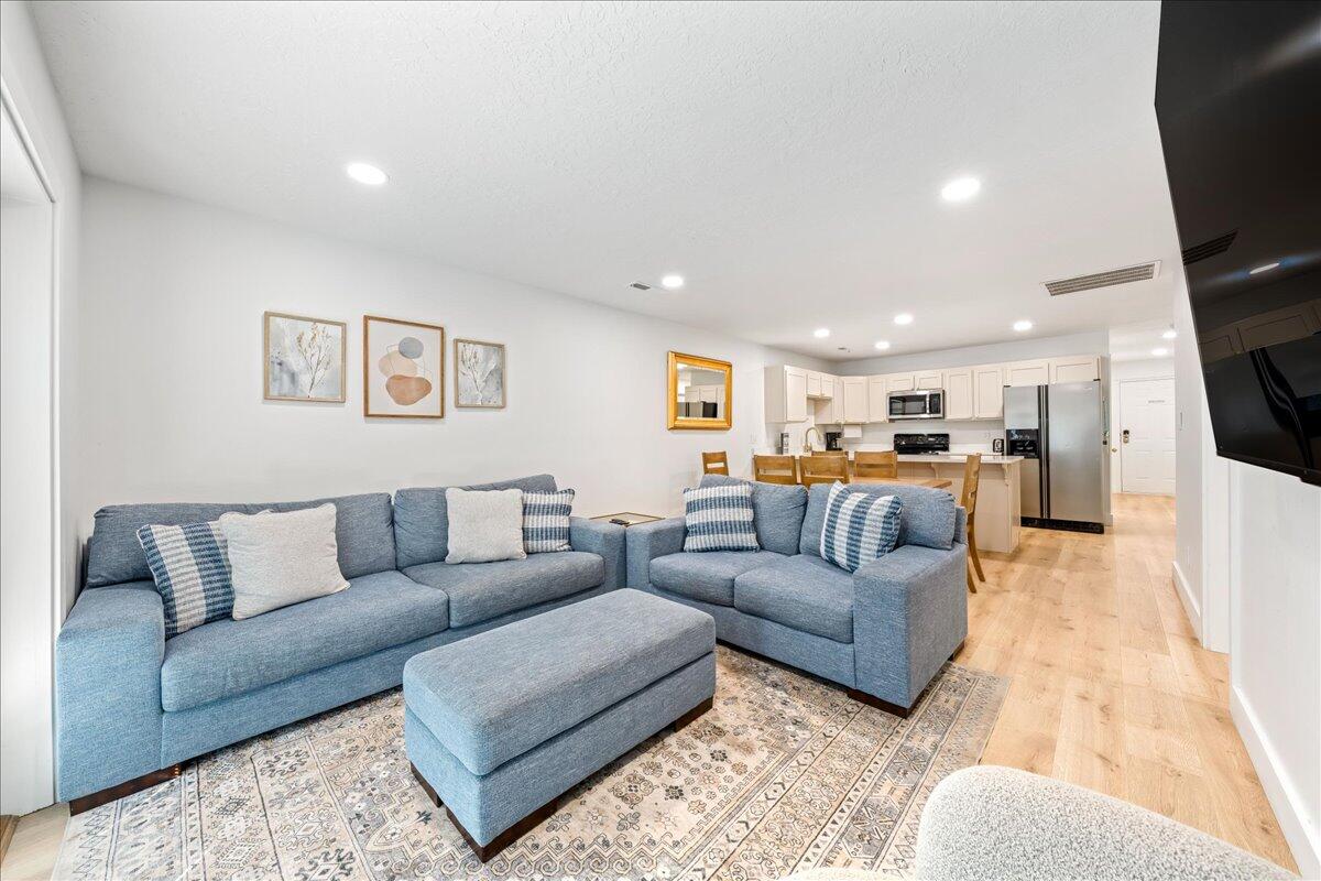 Beautifully remodeled 3-bedroom, 2-bath, 1,092 sq. ft. ground-floor condo in the highly sought-after Las Palmas Resort. Whether you're looking for a primary residence, vacation home, or investment property, this turnkey condo is ready to enjoy from day one.

Remodeled less than a year ago, the home features new flooring, updated bathrooms, fresh paint, nearly all new appliances, and stylish new furniture throughout--all of which is included with the sale. Simply bring your suitcase or start welcoming guests immediately.

The spacious primary suite includes a large ensuite bathroom with dual sinks, wall-to-wall mirrors, and a dedicated makeup vanity. An in-unit washer and dryer add everyday convenience, while the private back patio with BBQ is the perfect place to grill, relax, and entertain family and friends.

This first-floor unit is ideally located just steps from the resort's heated main pool and clubhouse, giving you quick access to the community's incredible amenities while maintaining easy, no-stairs access. The detached garage provides secure parking or generous storage for bikes, golf clubs, and outdoor gear.

Las Palmas Resort offers some of the best amenities in St. George, including multiple pools, a heated pool, waterslides, splash pad, fitness center, clubhouse, pickleball courts, basketball courts, walking paths, and direct access to miles of biking and hiking trails.

Location is hard to beat:

Minutes to Snow Canyon State Park
~15 minutes to downtown St. George
~15 minutes to St. George Regional Airport
~20 minutes to Sand Hollow State Park
~45 minutes to Zion National Park
Surrounded by several of Southern Utah's premier golf courses One of the biggest advantages of this property is that it is located in one of the few condo communities in St. George that is fully zoned for short-term rentals. Airbnb and VRBO are allowed, making this an exceptional opportunity for investors or owners looking to offset ownership costs with vacation rental income. The HOA also covers water, gas, DirecTV, Internet, and trash service, providing added value and convenience.

Whether you're looking for a personal retreat or a proven vacation rental opportunity, this beautifully updated, fully furnished condo offers the perfect combination of location, amenities, and investment potential.