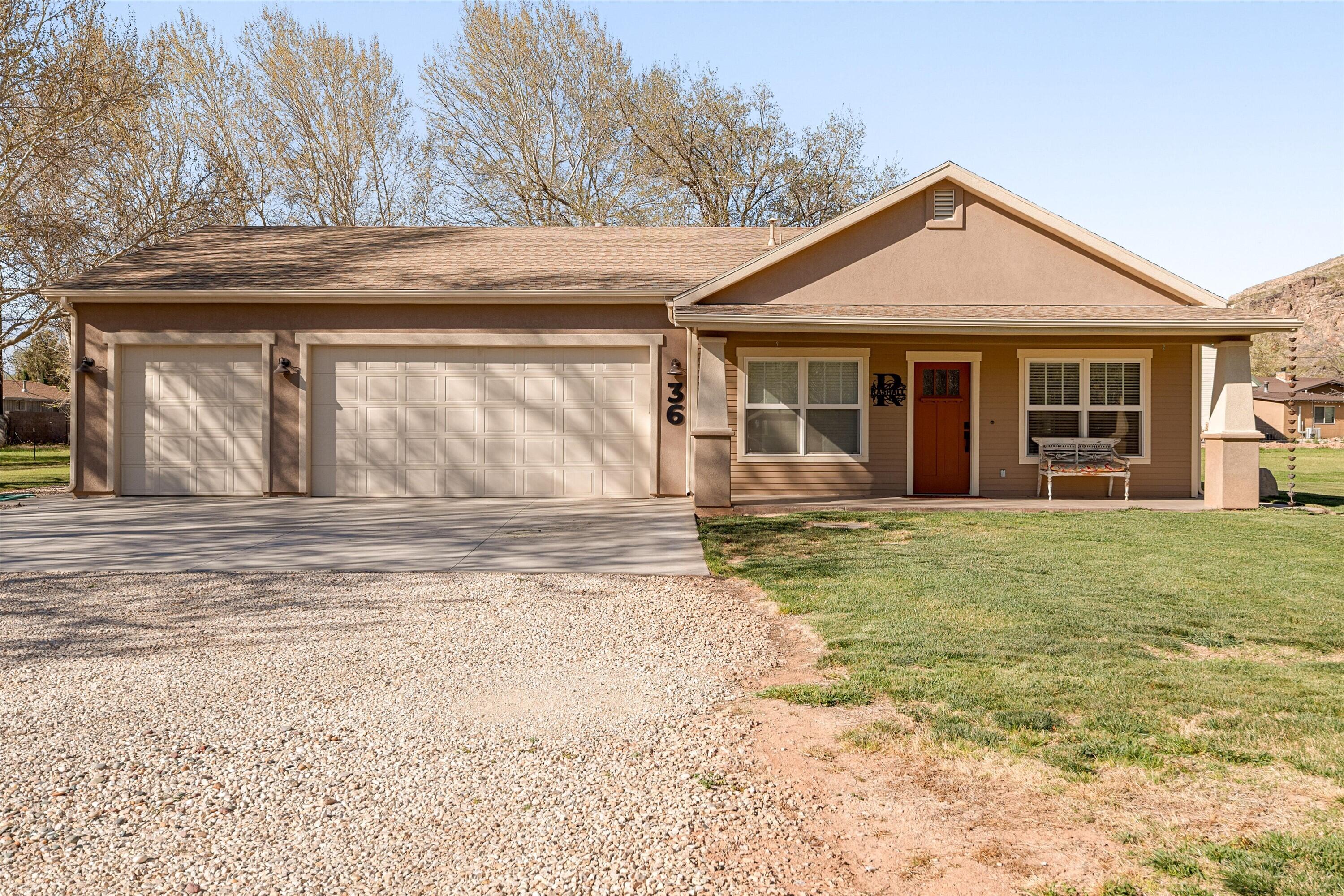 3 bed, 2 bath rambler on 1.01 acres in Hurricane with a single-level, functional layout and plenty of open space. Includes a 30' x 40' detached larch-built shop with a full bathroom, already wired for a mini split, ideal for a workshop, storage, or extra use space. Ample room for RV parking, equipment, or future additions, all in a convenient location with space to spread out. 1/2 share of water rights included-valued approximately 15k.