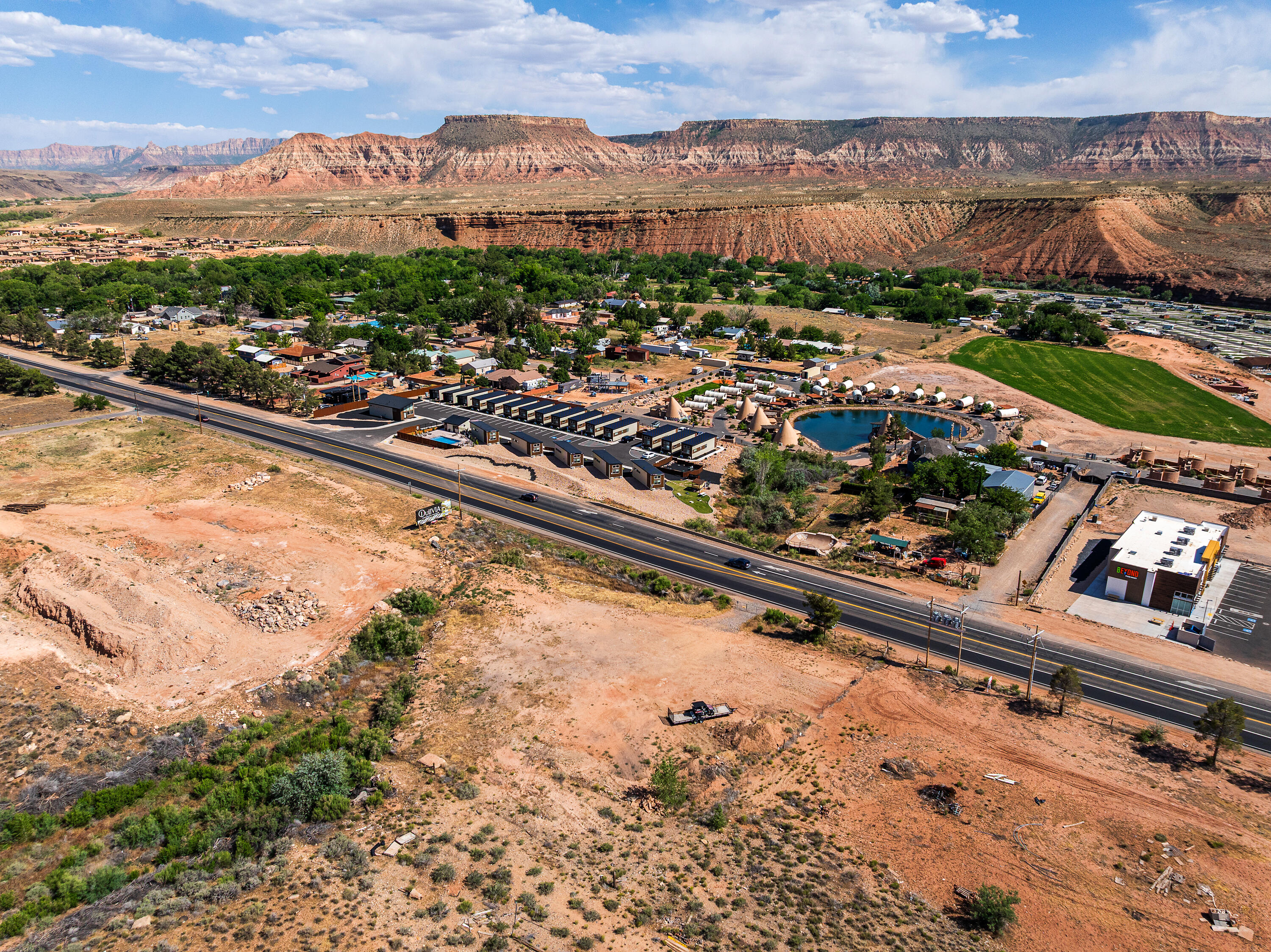 Rare 1.03-Acre Commercial Parcel on SR-9 -- Gateway to Zion

One of the only small-acreage commercially zoned lots available in Virgin, with prime SR-9 frontage on the main corridor to Zion National Park (≈5 million visitors annually).

Commercial zoning fully approved July 2025 and UDOT-approved Right-In/Right-Out access off 310 West -- a major win for commercial viability.

Directly across from the Virgin Sunoco gas station and White Bison RV & Campground, which holds the contract for Virgin's only bus stop and is actively developing new townhomes, retail, restaurant space, and reunion-style homes -- built-in foot traffic and a growing customer base right next door.

Development-ready: previous DRC application for two mixed-use commercial buildings was advancing with strong approval odds, so a buyer can pick up right where it left off. Power lines located on SW corner scheduled for relocation (Rocky Mountain Power + Town of Virgin) and fire hydrant is located close to SW corner of parcel. Soil tests and survey are available upon request.

Utilities: culinary water available, power is available through Rocky Mountain Power and power lines are on the property, septic will be the approved waste water system presently but sewer is set to come to Virgin in approx 2027 at least up to the White Bison RV Campground.

Comparable sales support $400K-$496K/acre. Ideal for retail, restaurant, services, mixed-use, or Zion-area tourism. Motivated and flexible seller.
