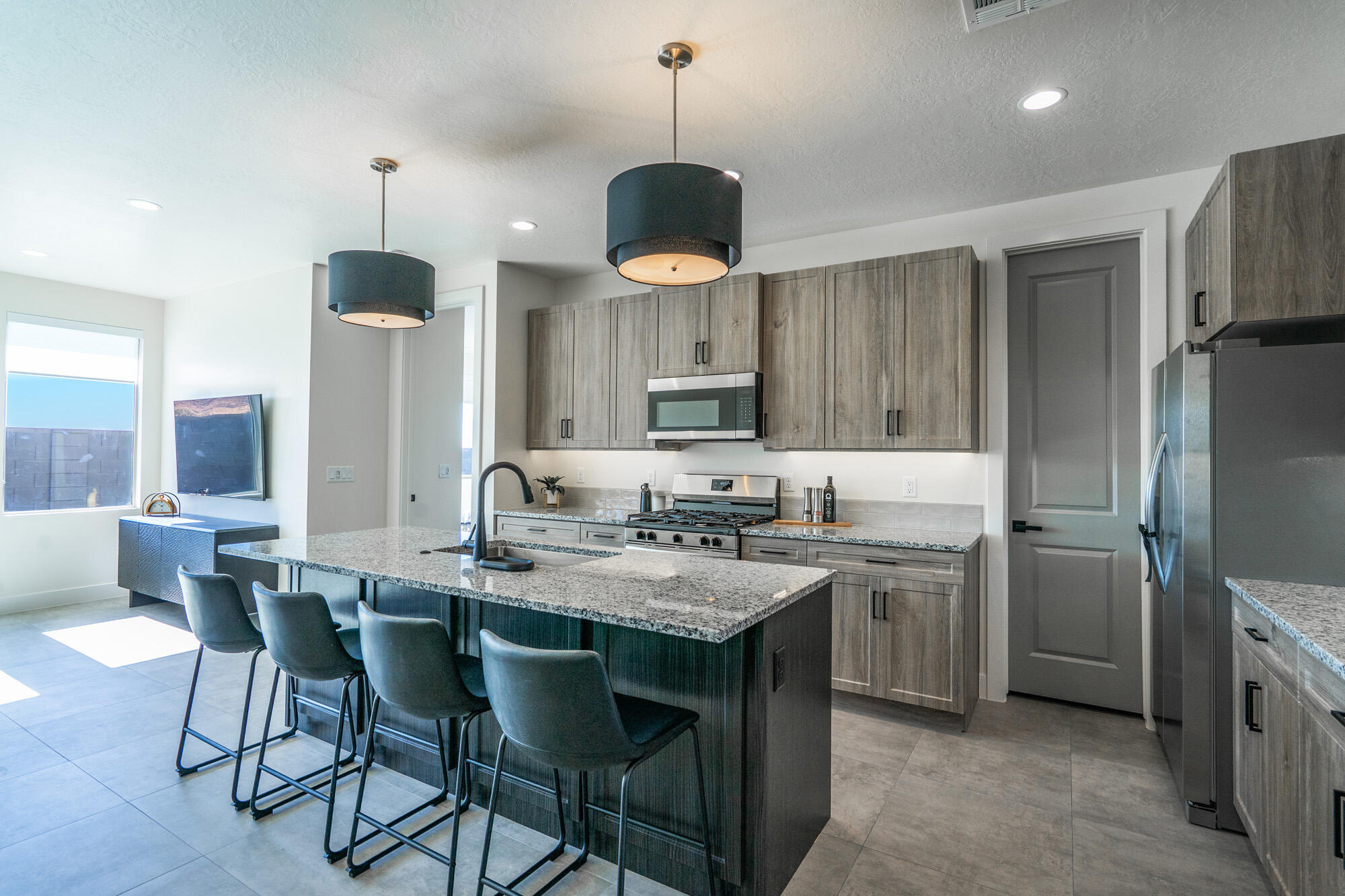 The Luna - MODEL HOME LEASEBACK- Designs may vary- This well-designed 3-bedroom, 2.5-bath home offers modern living with an open-concept layout connecting the spacious great room and stylish kitchen. Features include thermofoil cabinetry, granite countertops, a single-bowl stainless steel undermount sink, and a Frigidaire stainless steel appliance package with electric range, microwave hood, dishwasher, and refrigerator. Interior finishes include two-tone paint, tile or laminate flooring in main living areas, carpet in bedrooms, can lighting throughout, and ceiling fans in the living room and bedrooms. Bathrooms feature Moen plumbing fixtures and custom tiled showers/tub surrounds. Additional highlights include a laundry room with sink cabinet, extended finished garage with 50-amp EV breaker and room for a workshop or toys, block walls, and backyard space. Community amenities include a pool, hot tub, pool house, pickleball court, playground, and RV parking.
Builder incentives available with preferred lender. Qualified buyers may obtain:
• Conventional 7/6 ARM - initial interest rate ~5.50% on an adjustable-rate mortgage (ARM), fixed 7 yrs, adjusts semiannually
• FHA 5/1 ARM - initial interest rate ~4.75% on an adjustable-rate mortgage (ARM), fixed 5 yrs, adjusts annually
Seller contributes 2.5% + lender contributes 1.5% (with Guild Mortgage), which may be used toward a temporary rate buydown, closing costs, and/or prepaids--reducing initial monthly payments. Lender Incentives available only when financing is obtained through Matt Hickman at Guild Mortgage.OAC. Rates subject to change. APR may be higher. Pool House, Playground and BBQ area coming NOW!

Builder  Warranty, Lender Incentives! Seller offering up to 3% toward buyer closing costs, depending upon offer.
