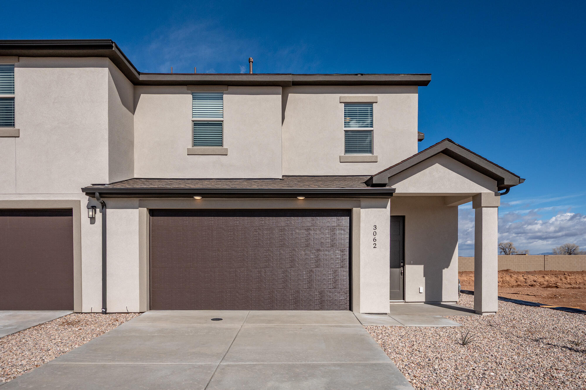 Beautiful new two-story twin home with 4 bedrooms, 2.5 baths, a versatile loft, and a 2-car attached garage. Tall ceilings and upgraded finishes create an open, modern feel throughout. Fully landscaped with a block wall along the backyard, this quality-built home offers thoughtful design and move-in-ready convenience.