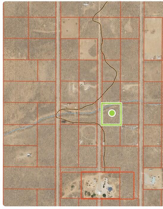 Beautiful off-grid parcel in Cedar Valley Acres with expansive mountain views, open space, and no HOA. No utilities currently stubbed in. Water rights available separately. Seller financing available, call for details.