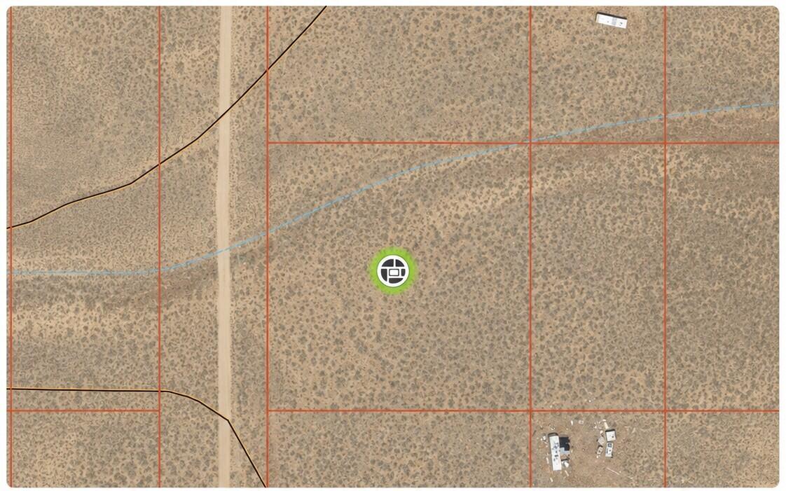 Beautiful off-grid parcel in Cedar Valley Acres with expansive mountain views, open space, and no HOA. No utilities currently stubbed in. Water rights available separately. Seller financing available, call for details.