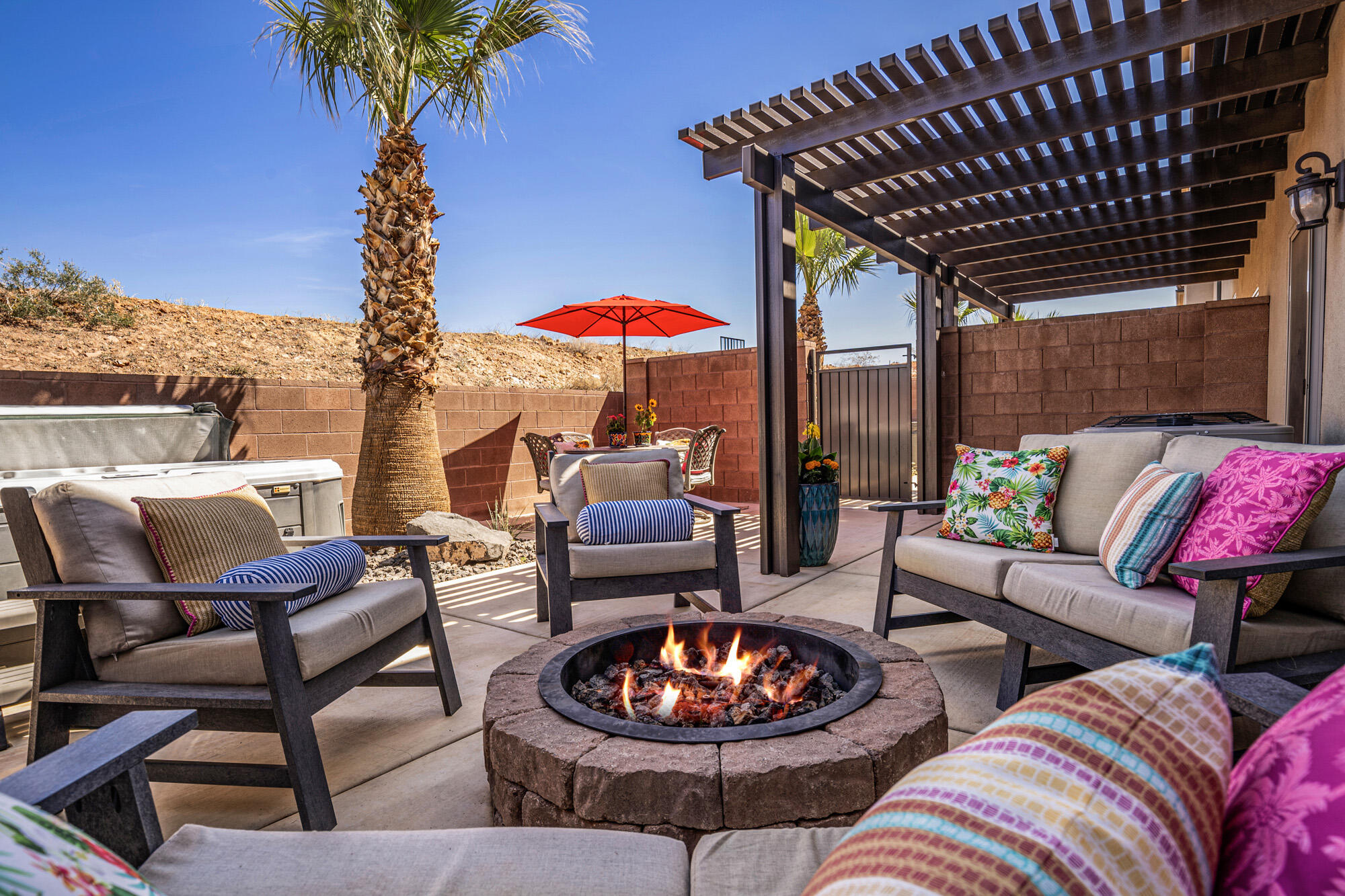 *FULLY FURNISHED, Approved Nightly Vacation Rental. *Manage it yourself or Hire your own Manager. Located just off I-15 Exit 13. *Private Hot Tub & Gas Firepit. *Directly across from the Community Pool. Bright & Open Concept Floorplan. Quartz Countertops, Stainless Steel Appliances & Sliding Glass Door to the Outside Living Space. 2nd level Large Gathering Room with Arcade Games. Primary En-Suite w/Barn Sliding Door, Spa Like Master Bathroom includes Separate Soaking Tub, Walk-in Glass Shower & Walk In Closet. *Prime Location with Endless Recreation Nearby:  Zions National Park, Bryce National Park, Brian Head Ski Resort & Pine Valley. Miles of Walking & Biking Paths right out your Front Door. Only a Quick Drive to both Quail Creek Reservoir & Sand Hollow Reservoir. Surrounded by Multiple World Class Golf Courses. Monthly HOA covers master insurance policy, pool maintenance, landscaping, and High=speed Internet!