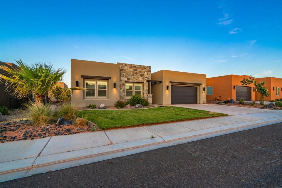 Located in the highly desirable Sand Hollow area, this well-maintained single-level home offers the perfect blend of comfort, functionality, and lifestyle. Featuring 3 bedrooms, 3 bathrooms, and approximately 2,147 sq ft, the home is thoughtfully designed with an open-concept layout, abundant natural light, and seamless flow for everyday living and entertaining. 

The spacious great room connects effortlessly to the kitchen and dining area, creating a welcoming central hub of the home. Generous bedroom sizes, including a private primary suite, provide both comfort and flexibility.

Situated on a 6,970 sq ft lot, the property offers low-maintenance outdoor space with room to relax and enjoy Southern Utah's year-round climate. 

Located just minutes from Sand Hollow Reservoir, Sand Dunes, world-class golf, and Zion National Park, this home places you right in the middle of Southern Utah's best recreation and scenery. 

Whether you're looking for a primary residence, second home, or investment opportunity, this property delivers on location, livability, and long-term value.

Home is occupied, must call to schedule all appts.