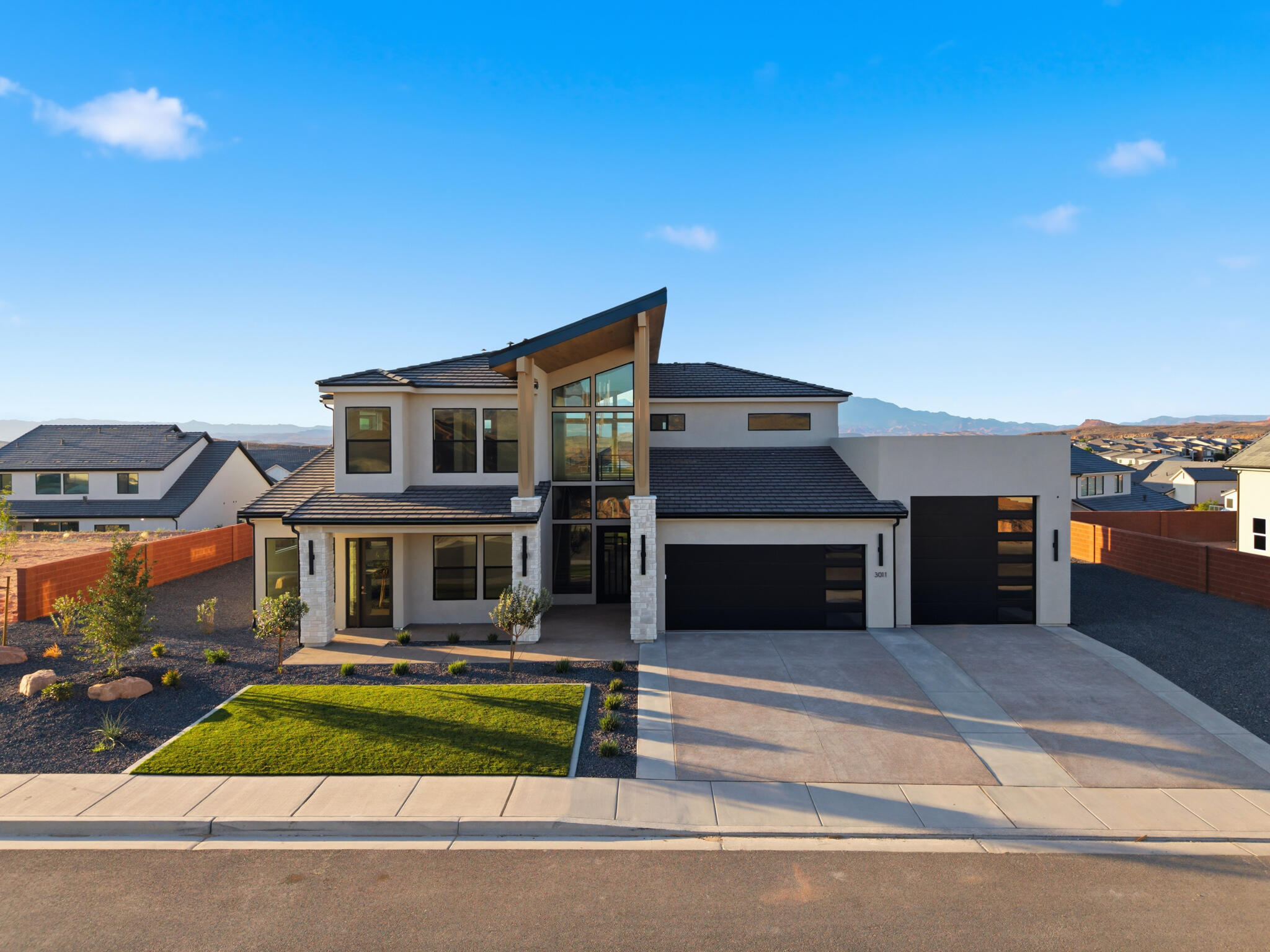 Striking new construction with modern design and flexible living spaces. This 5 bed, 4.5 bath home features an attached casita ideal for guests or potential rental income. A 2-car garage plus oversized RV/boat garage and additional parking offer exceptional functionality. The thoughtfully designed layout includes an extra upper-level family room, a dedicated theatre, and a spacious primary suite with a second laundry area. Enjoy seamless indoor-outdoor living with a covered deck and patio, perfect for entertaining or relaxing. A rare combination of style, space, and versatility in a beautifully designed spec home! Outdoor living is equally impressive with a covered deck and patio, perfect for relaxing or hosting gatherings while enjoying the surrounding views.
