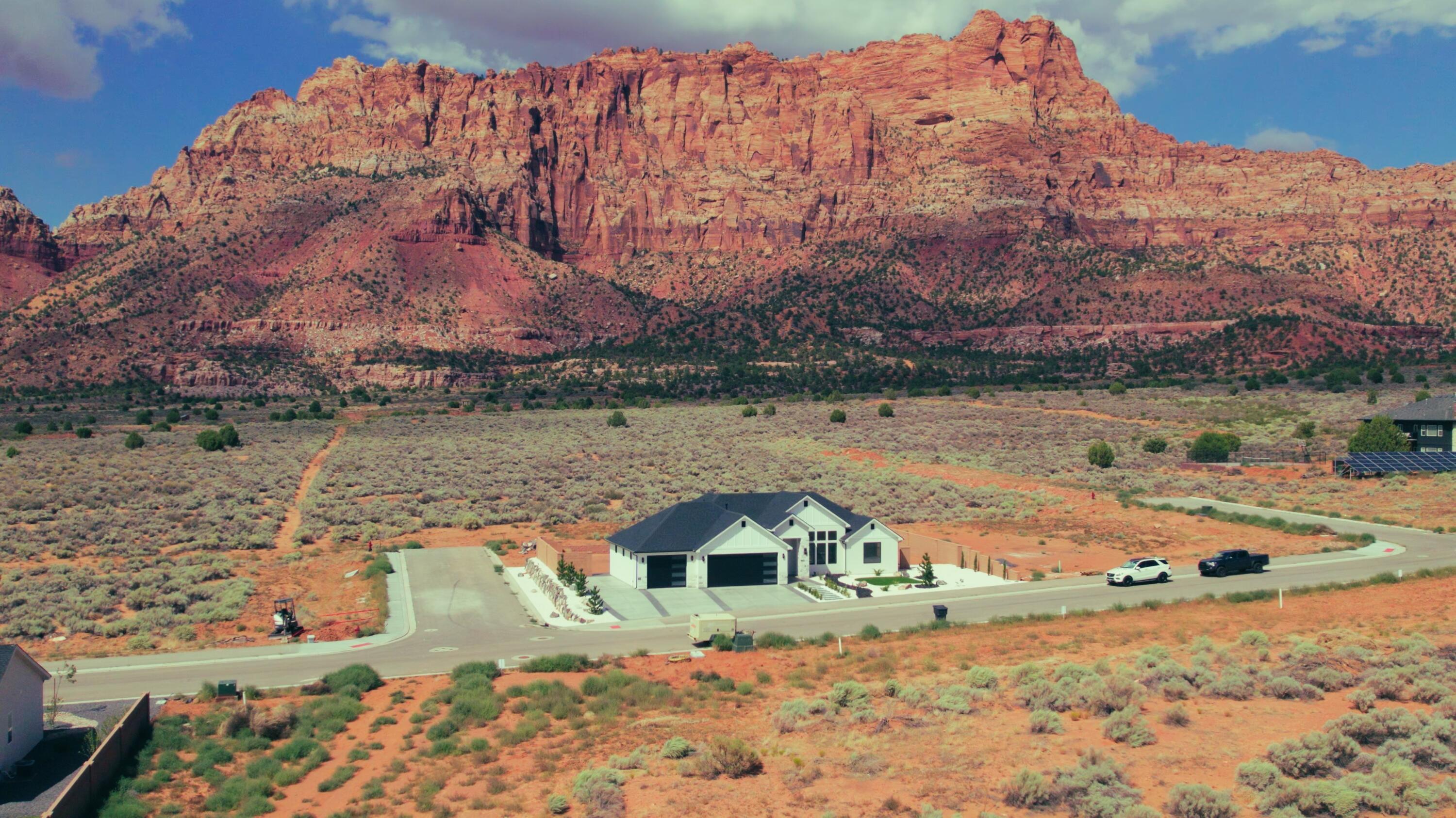 Stop scrolling. This is the one. For 150,000 you lock in the land and for under 500,000 to 600,000 all in you are moving into a brand new home with a view that does not exist anywhere else in Washington County. Period.

The Heights is not just lots. It is life on the edge of Zion National Park. Every morning the cliffs light up like a painting and every evening the desert sky puts on a private show. Step outside and the adventure is endless with BLM trails, slot canyons, Coral Pink Sand Dunes, Bryce Canyon, the Grand Canyon and Lake Powell all within reach. This community comes stacked with walking paths, pickleball courts, parks and room to breathe because your backyard deserves to be just as epic as the view.

This is more than dirt. It is a once in a lifetime chance to build the Southern Utah lifestyle you have always wanted and to do it under 600K. No gimmicks. No compromises. Just views, value and the adventure of a lifetime.