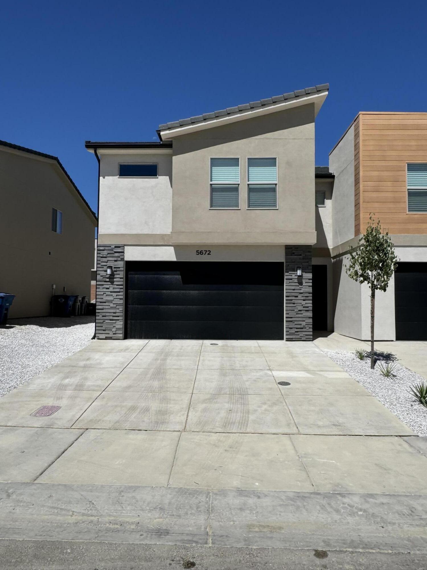 Discover the perfect blend of comfort and convenience in this like new 4-bed, 2.5-bath end unit townhome. Featuring an open and inviting floor plan. This home offers generous living spaces filled with natural light, ideal for both everyday living and entertaining. The well-appointed kitchen offers an oversized pantry, quartz countertops, stainless steel appliances (INCLUDING REFRIGERATOR) and flows seamlessly into the dining and living areas. Upstairs, the primary suite includes a private bath with a walk-in shower and spacious walk-in closet, while the three additional bedrooms offer flexibility for family, guests, or a home office. Enjoy low-maintenance living with fantastic community amenities, including a pickleball court, tot park, and additional guest parking for added convenience. Ideally located near the new Costco, along with other shopping, dining, schools, and parks. This move-in-ready townhome offers the perfect combination of comfort, style, and community living. Agent related to seller.
