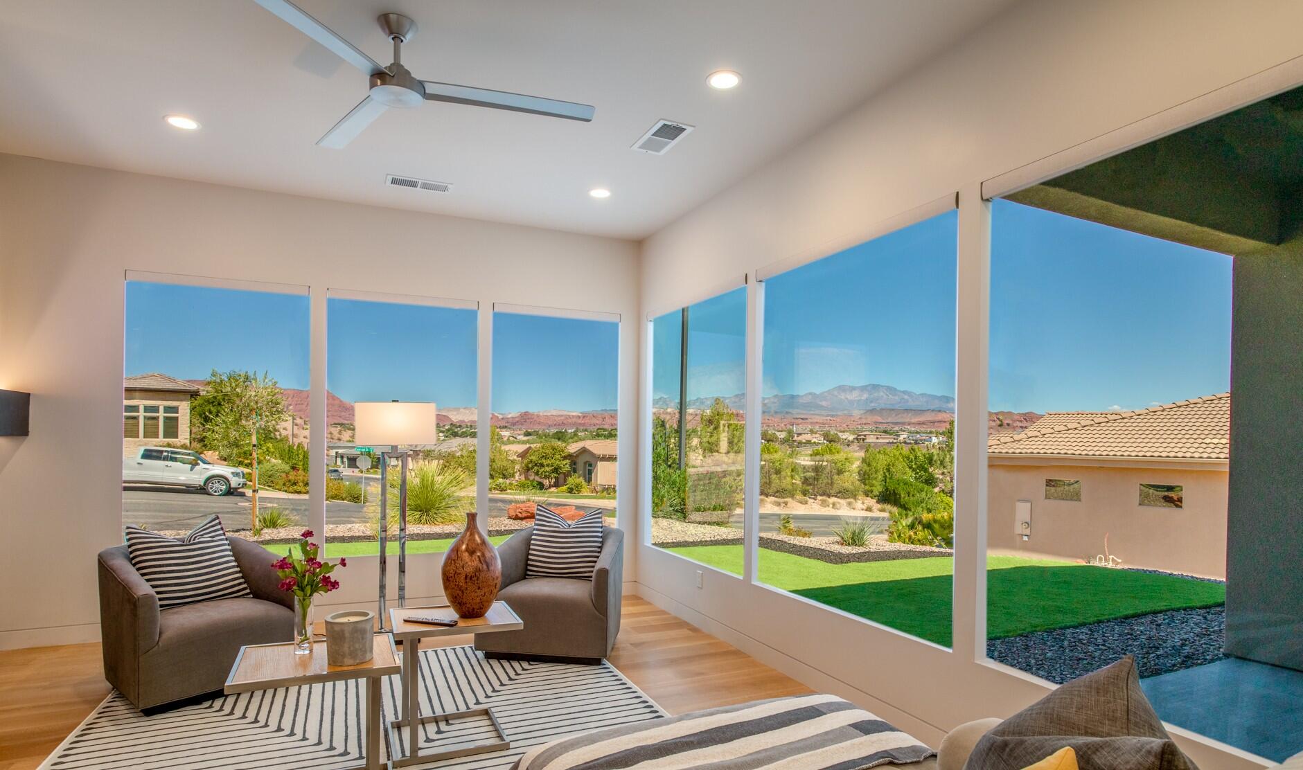 VIEWS VIEWS VIEWS! You've found the VIEWS you've been waiting for. Perfectly positioned above Sunbrook Woodridge Hole #3, this stunning custom home captures breathtaking 360Â° views of the golf course, surrounding landscape, and vibrant Southern Utah skies from nearly every room. Meticulously maintained with high-end appliances, induction cooktop, 8' solid wood doors, automatic blinds, rift oak cabinetry and flooring, plus five sheer walls, walk in butler pantry, and . Soundproof room, wired for a hot tub, and move-in ready. Luxury living with unforgettable VIEWS.