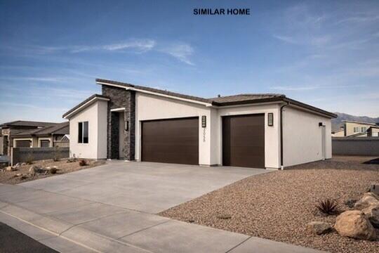 TO BE BUILT  in beautiful Sky Mountain golf course development. This 3-bedroom, 2-bathroom 3 Car Garage home perfectly blends comfort and functionality. Enjoy beautiful sunsets. Home equipped with quartz countertops, soft-close doors and drawers, a stunning tile primary shower, durable LVP flooring, and stylish two-tone paint. Added privacy and security with rear and side wall already included. Don't miss the chance to own a brand-new home in a community where you have the freedom to make it yours! Hurry in today! An amenities association is available!