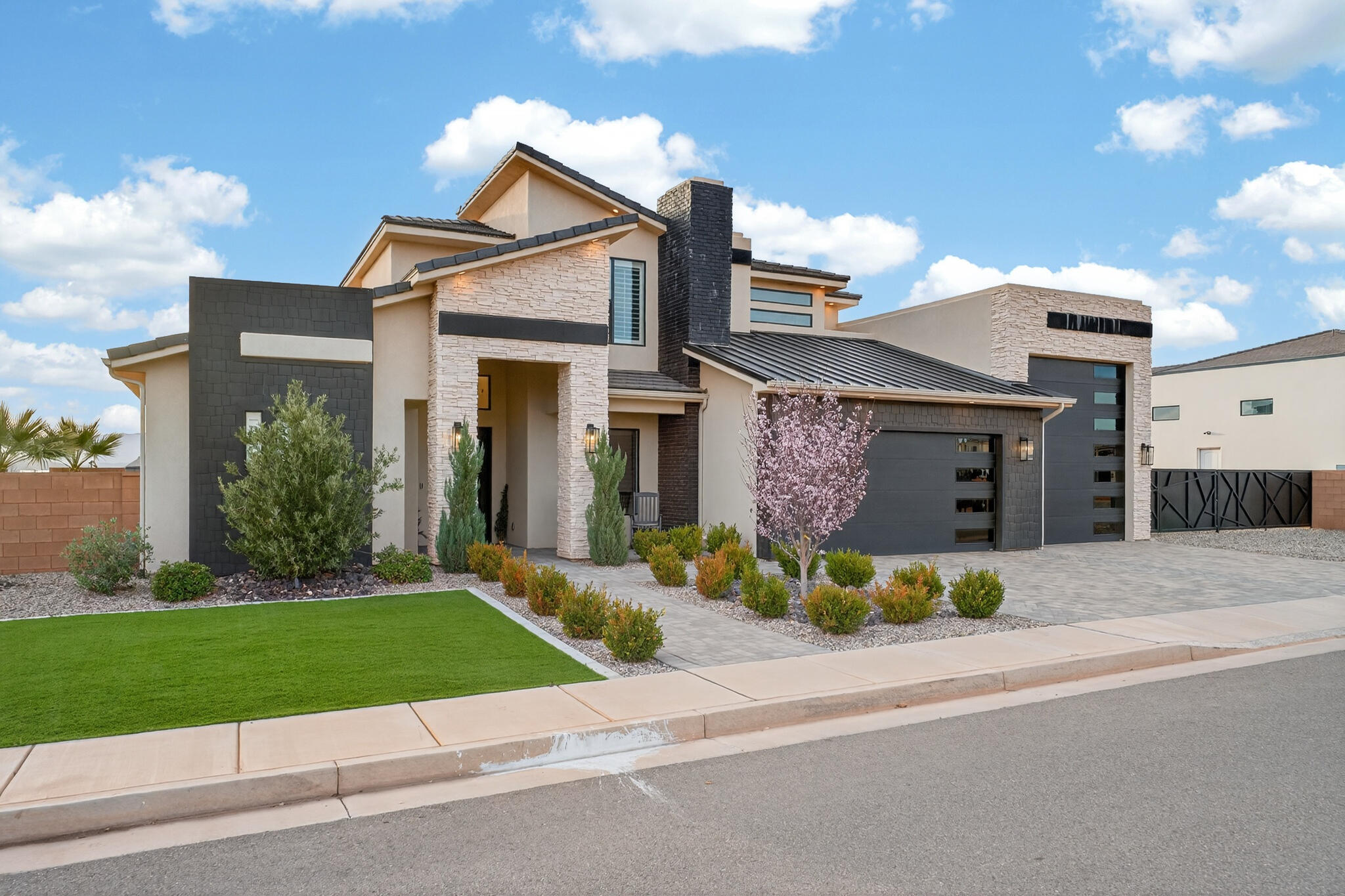 Beautiful 5-bedroom, 4-bath home built in 2022 located in the highly desirable Washington Fields area. This nearly 3,800 sq ft home features an open floor plan, chef's kitchen with large island, double ovens, gas cooktop, and hidden pantry, all flowing into a spacious living area with custom built-ins and gas fireplace. The main-level primary suite offers patio access, a freestanding soaking tub, and large walk-in shower.

Enjoy Southern Utah living in the backyard with a private pool, fire pit area, and covered patio perfect for entertaining. Situated on a .30-acre lot with a rare 5-car garage including a deep RV garage and additional RV parking.

Located in the Crimson Cliffs school boundaries with a neighborhood park and playground just down the street. This welcoming community is known for its neighborhood block parties and friendly atmosphere.