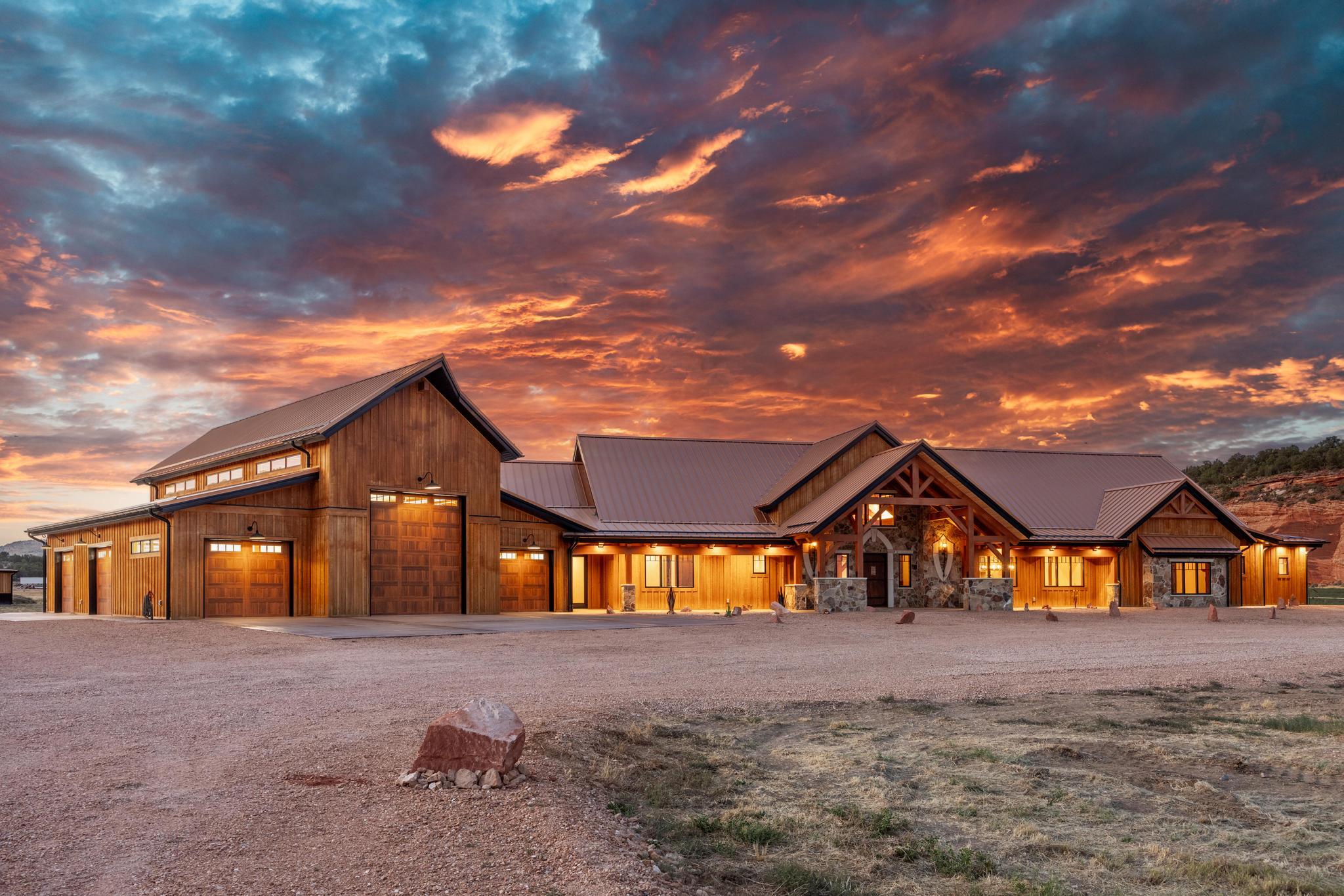 Set beneath the towering sandstone cliffs of historic Johnson Canyon, this 30+ acre private estate is more than a home — it is an experience. Surrounded by sweeping 360-degree views and extraordinary natural beauty, the setting alone is unforgettable.
Built with true old-world timber frame craftsmanship, the residence blends structural artistry with warmth and welcome. Exposed beams, natural stone, and curated lighting create a space that feels both grounded and refined. The chef's kitchen was designed for serious gathering — generous in scale, effortless in flow — connecting seamlessly to open living spaces made for conversation and connection.
Thoughtful separation between the primary suite and guest quarters offers privacy and comfort, while a custom executive office, theater room whiskey and wine vault, and integrated safe room add depth and distinction.
A grand waterfall entry, outdoor kitchen pavilion, private shooting range, and expansive canyon views complete the sense of retreat.
This is a rare opportunity to own a truly distinctive legacy property in one of Southern Utah's most dramatic landscapes.
Seller open to creative financing options.
