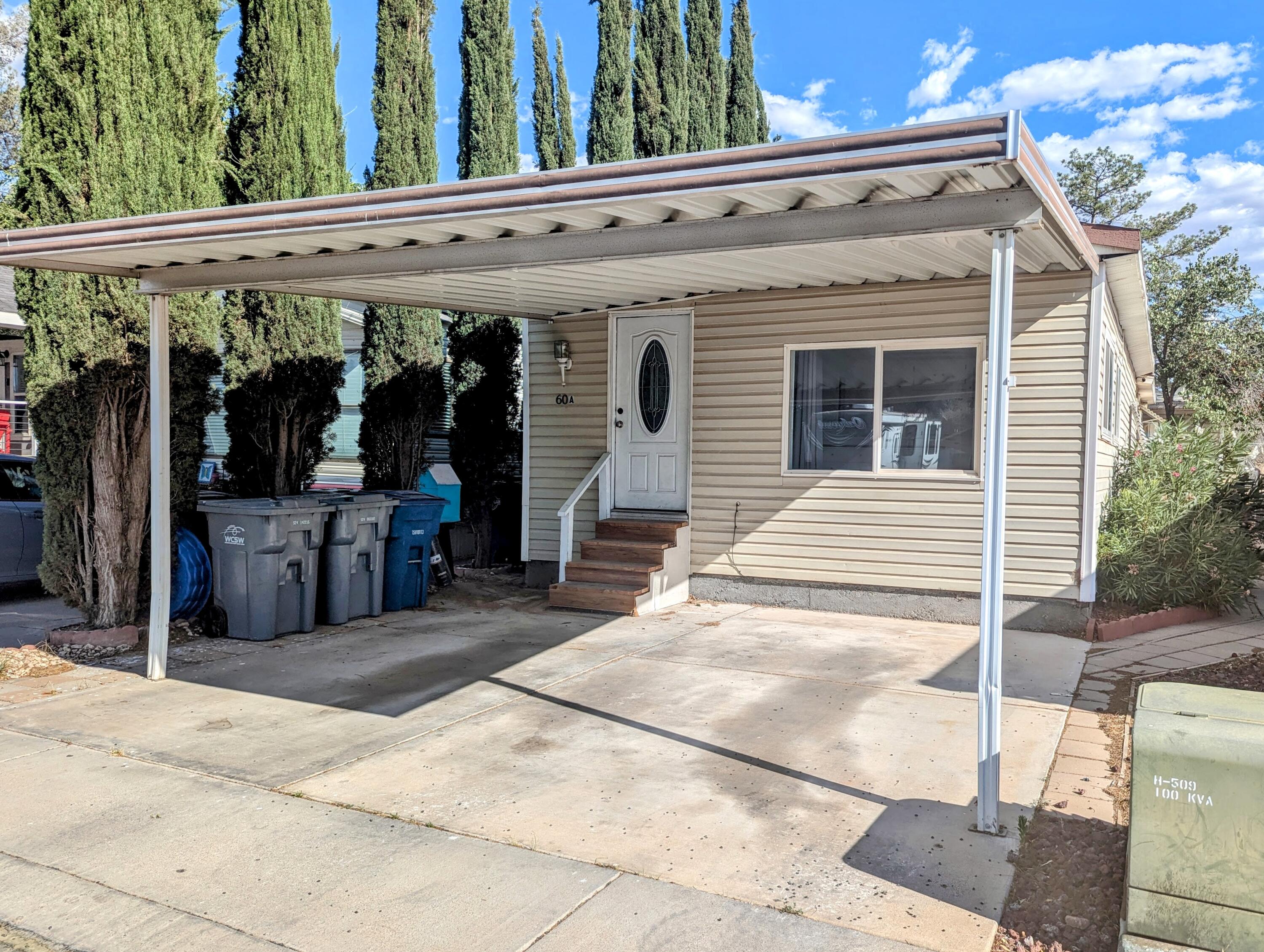 Affordable Park Model with bonus Addition on Permanent Foundation, with Affidavit of Fixture, & Land/Lot included! Addition includes XL Bedroom with it's own bathroom and laundry units included! Other features include 2 car covered parking, storage shed, newer HVAC system, newer windows, flooring, paint, shade trees (including a large apricot tree), yard space with fire pit & room for garden. Low HOA dues at only $91/month pay for water, trash, sewer & access to the Clubhouse, indoor & outdoor Pools, Playground, & Picnic tables. Includes all appliances! Vacant & ready for a new buyer to call home.